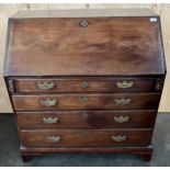 Georgian writing bureau, the sloped top opening to a writing surface with storage compartments,