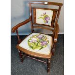 Edwardian arm chair, the back designed with embroidery above an embroidered seat and open arm