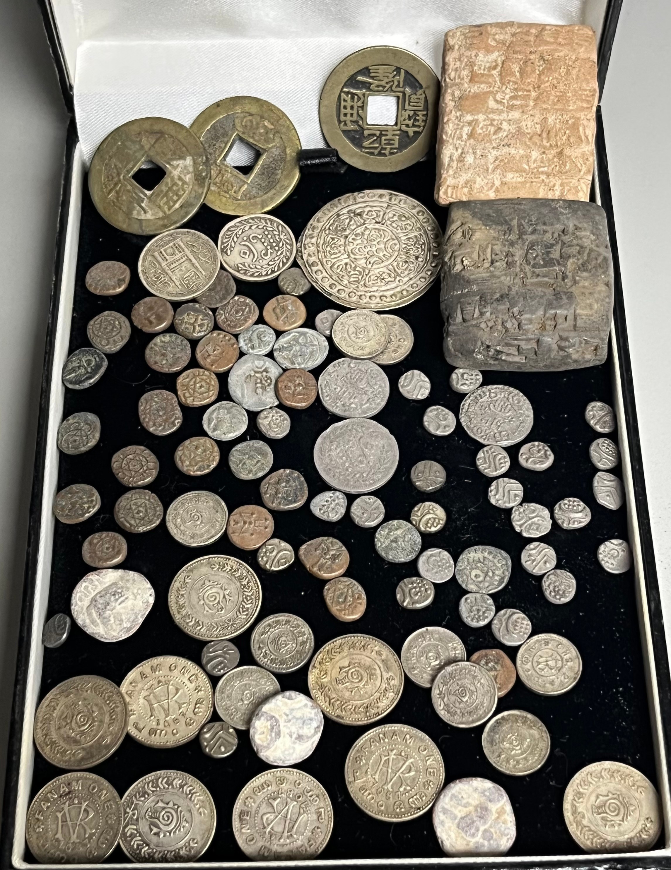 A Quantity of antique middle and far east coinage. Include two Hieroglyphic style stones. Antique