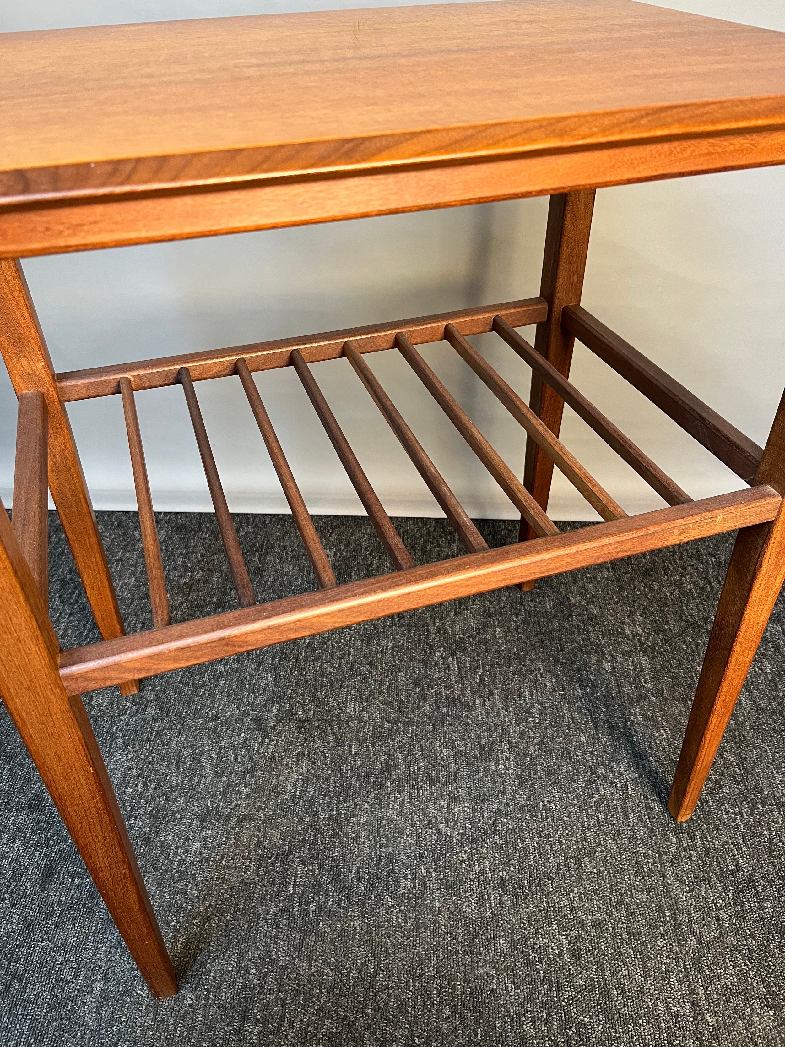 Mid-century side table, the rectangular top above a racked shelf, raised on square tapered legs [ - Image 3 of 3