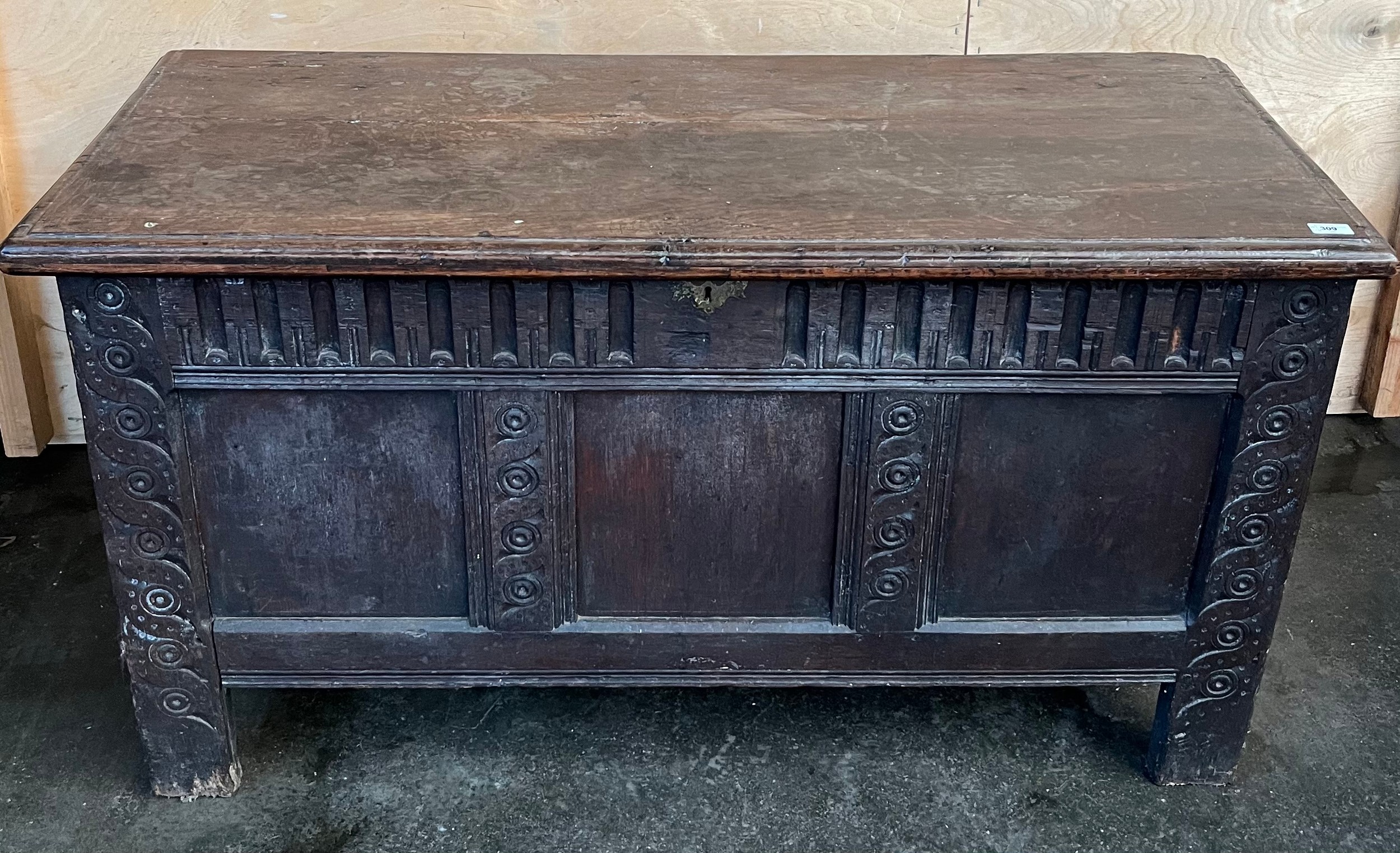 18th/19th century trunk, the rectangular lift up top, above a carved base raised on block legs [