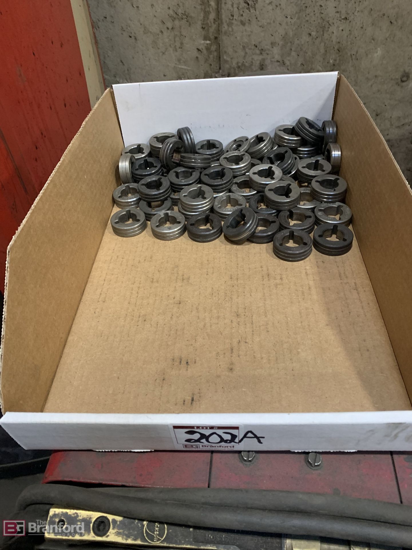 Lot Box of Miller and Lincoln Wire Feeder Bushings