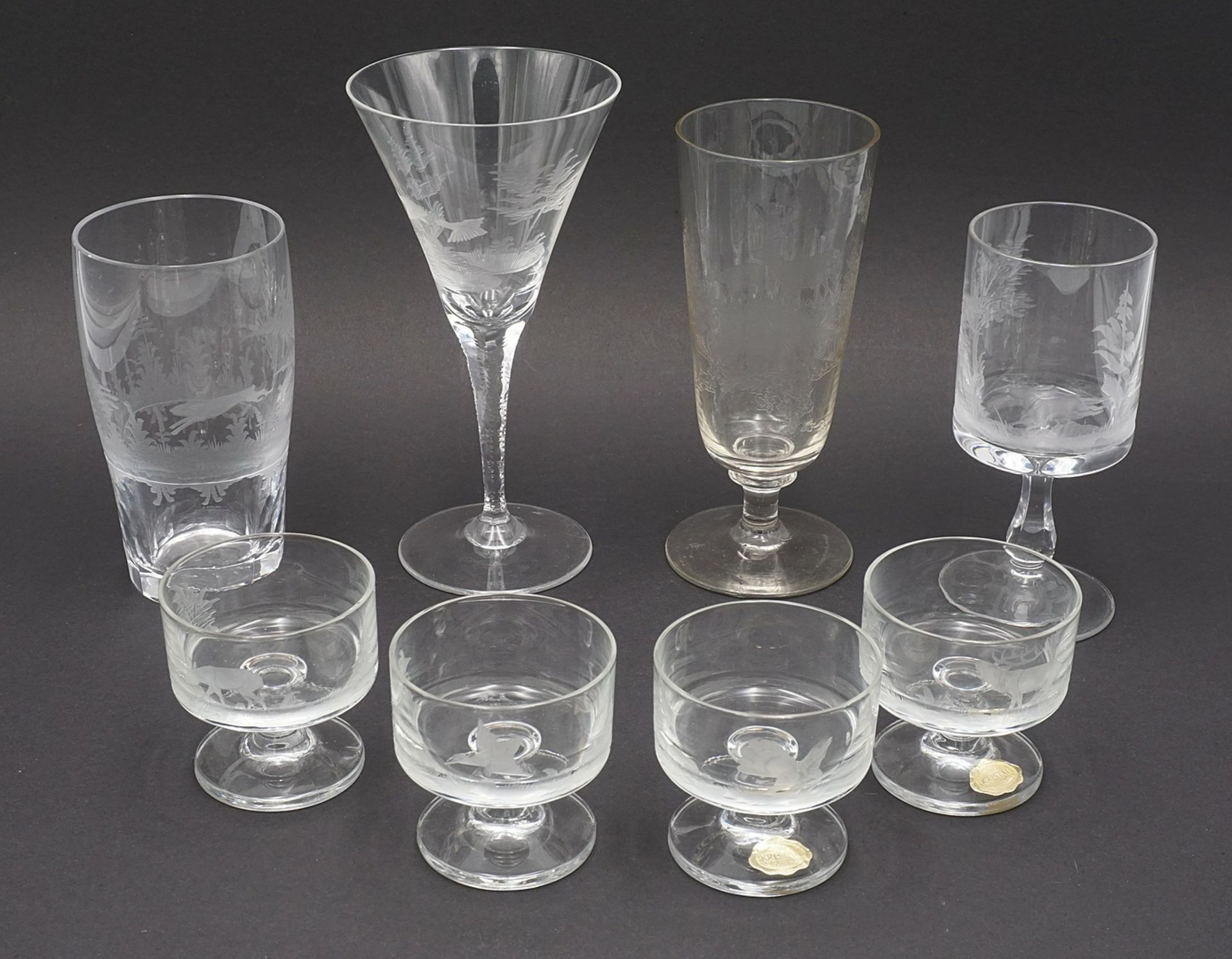 Eight glasses with animal motifs