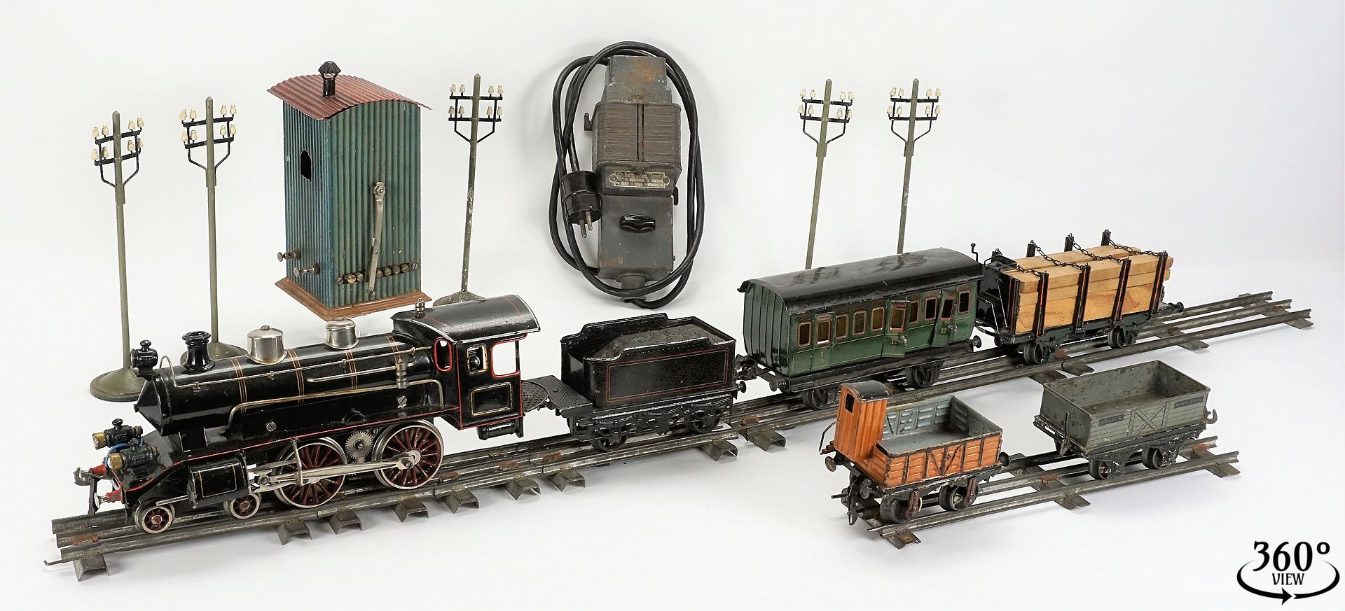 Bing elektrische 2B Schlepptender-Lok mit 4 Wagons und Zubehör, um 1920