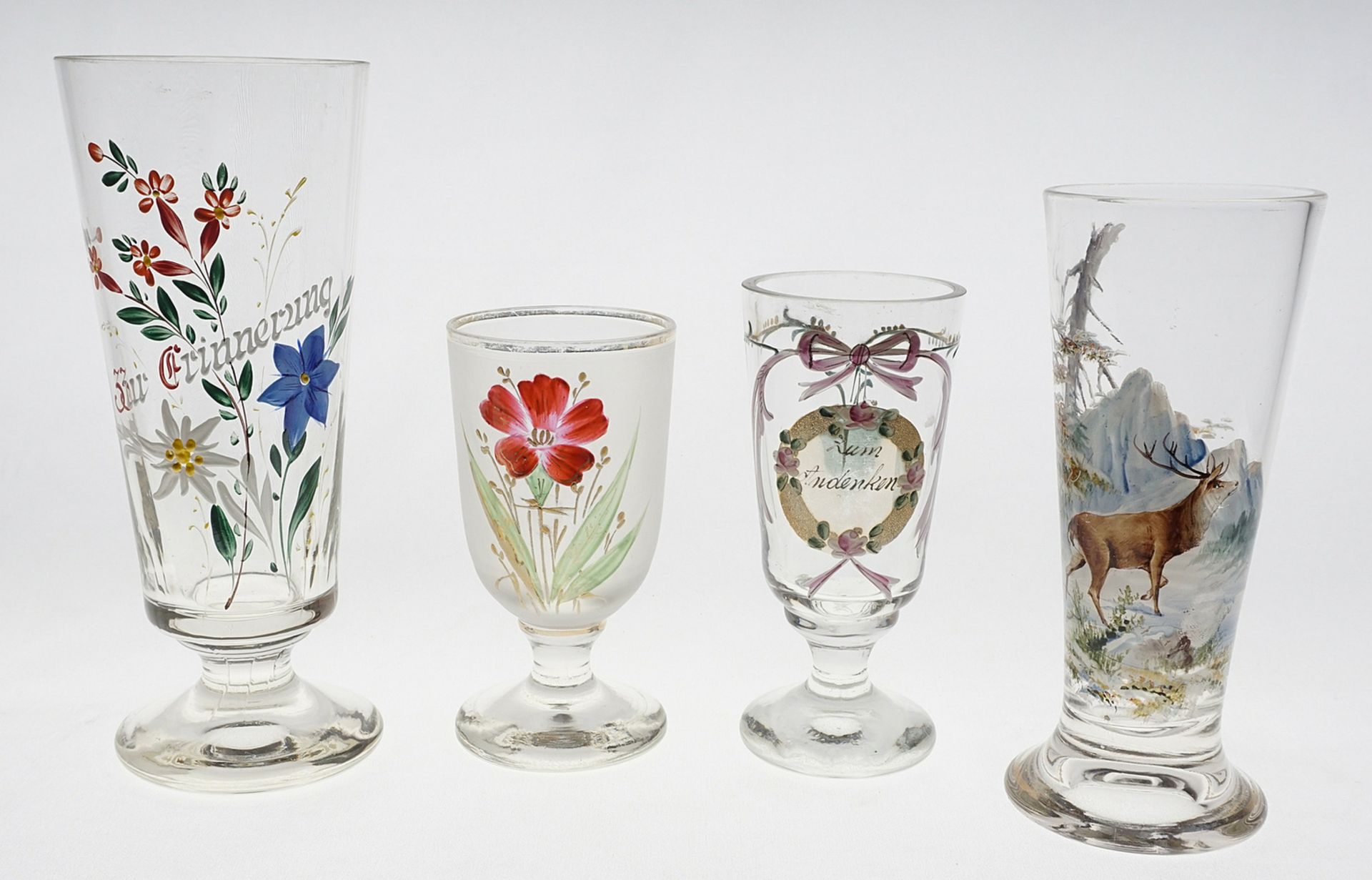 Four souvenir glasses, around 1900