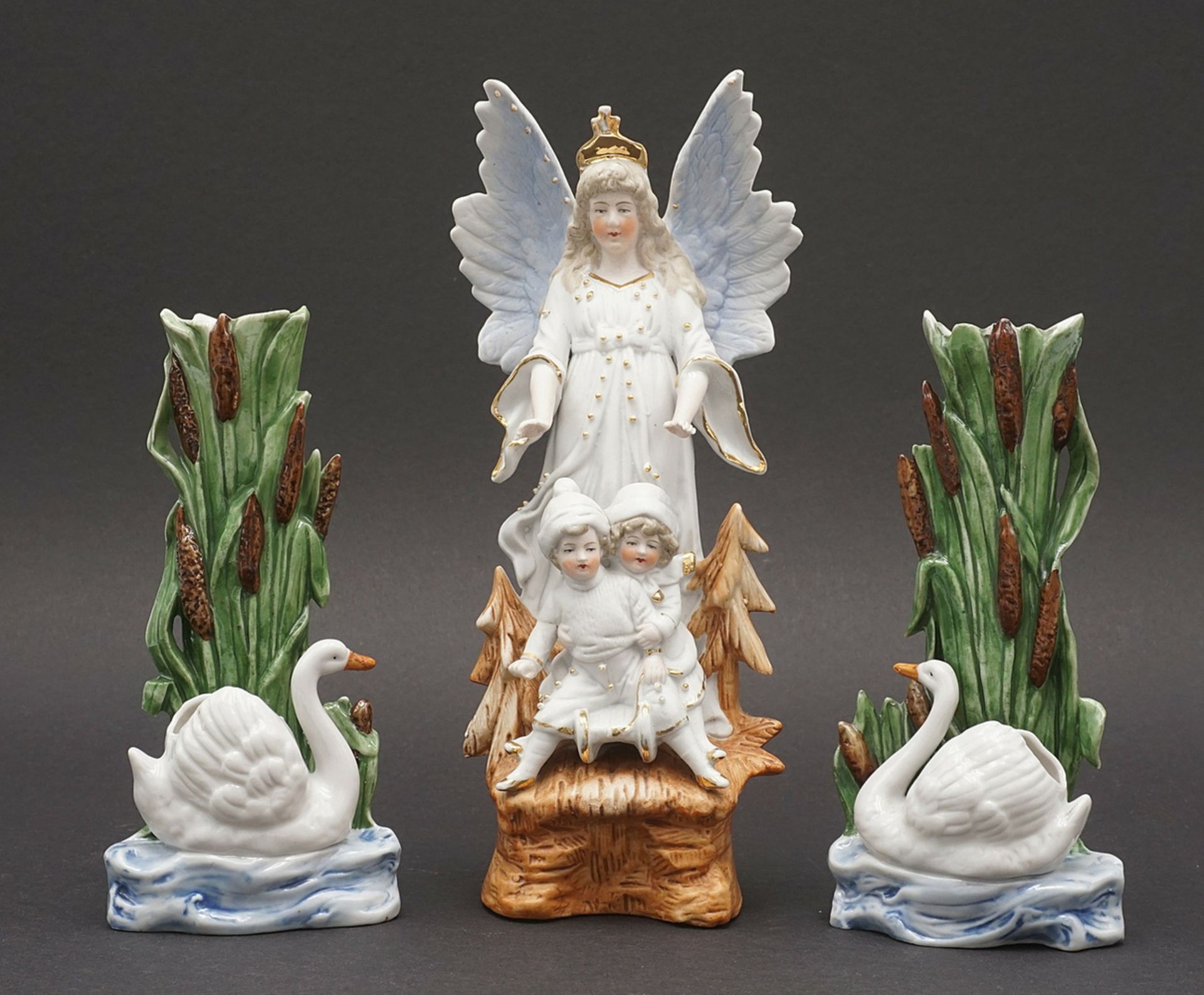 Vertiko figures, guardian angels and a pair of swan vases  