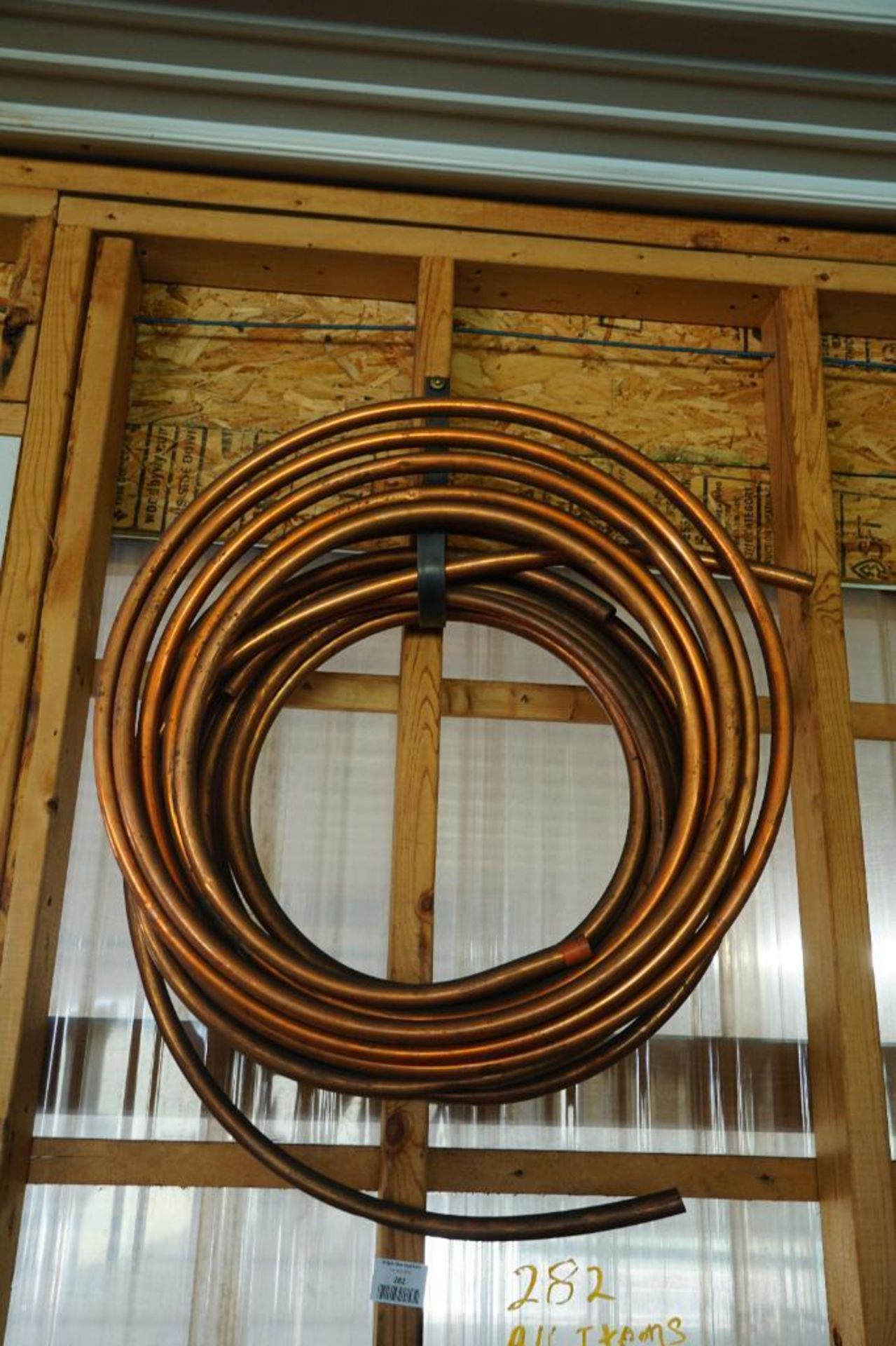 Copper Tubing and V Belts on Wall