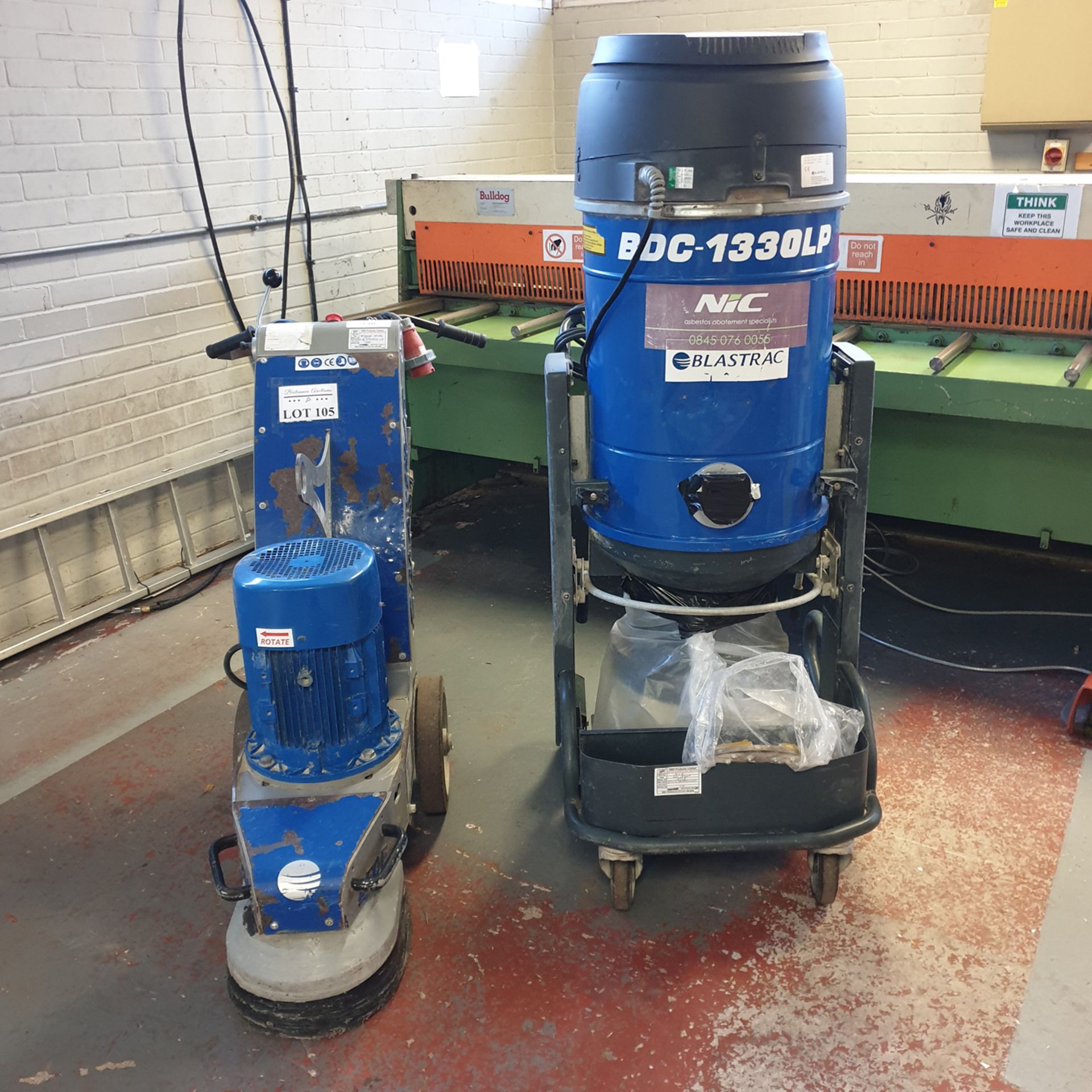 Blastrac Floor Grinding Machine with Associated Vacuum Cleaner.