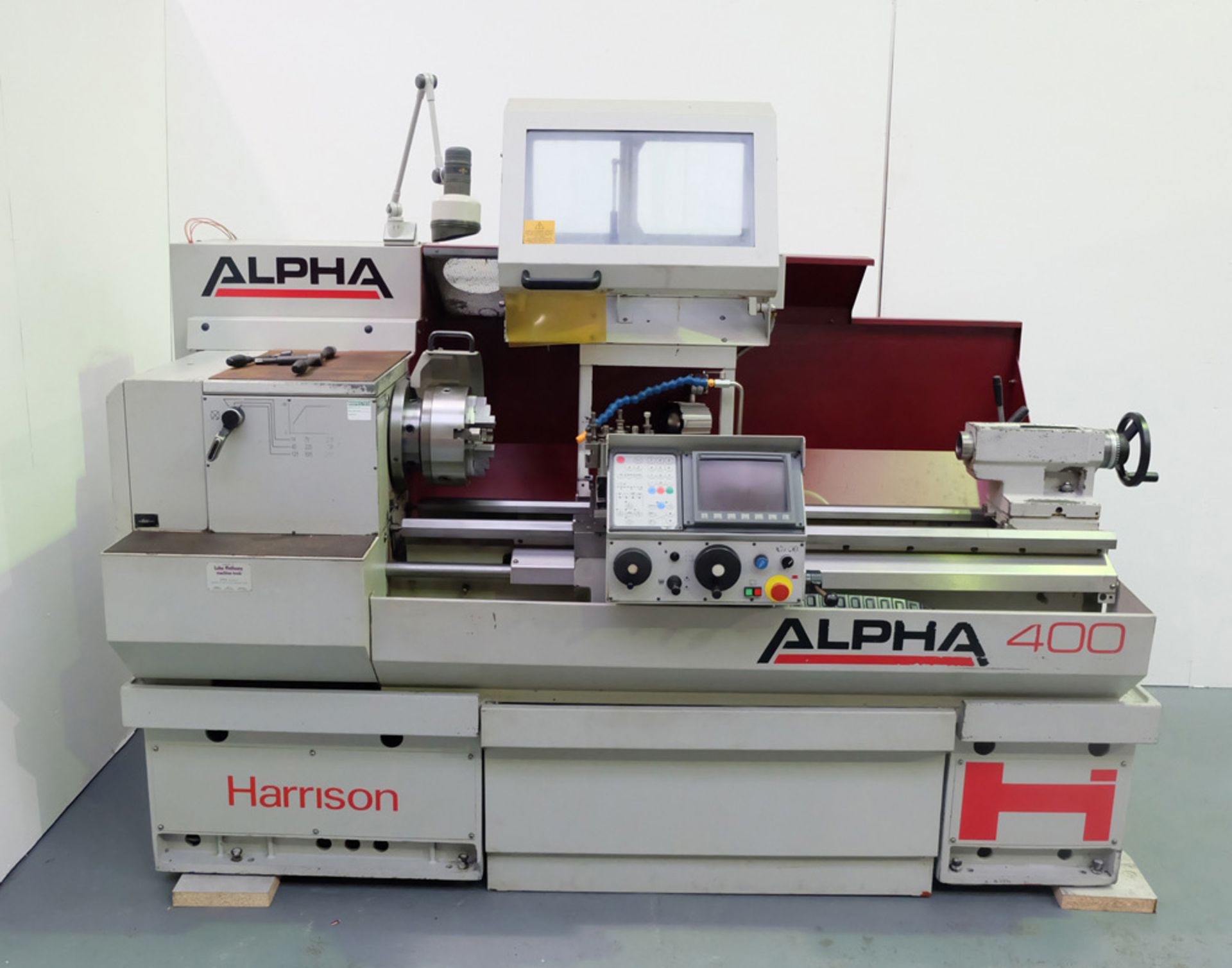Harrison Alpha 400 CNC Teach Lathe with G.E. Fanuc Control.