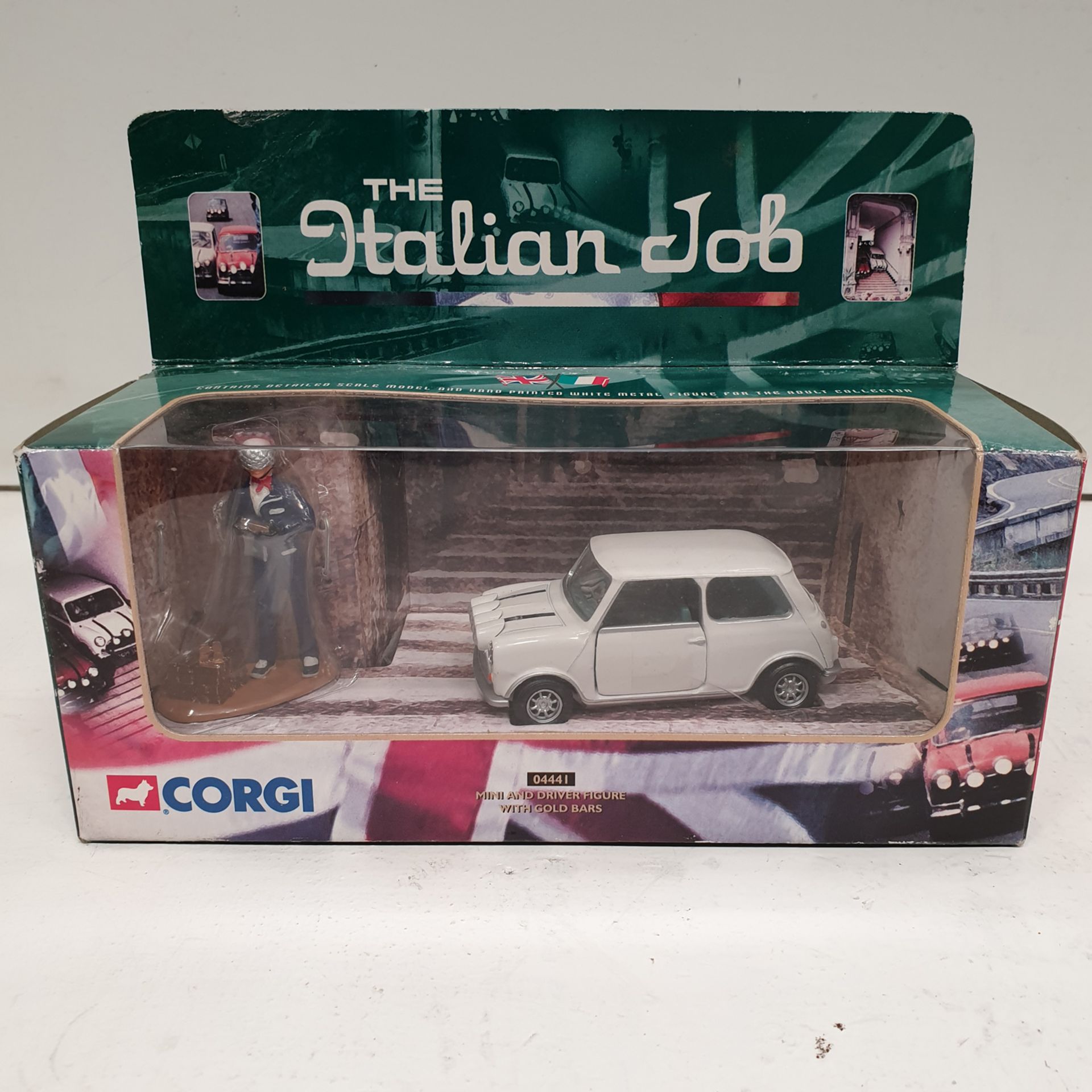 Corgi Model 04441 'The Italian Job' White Mini Car Model with Driver Figure and Gold Bars.