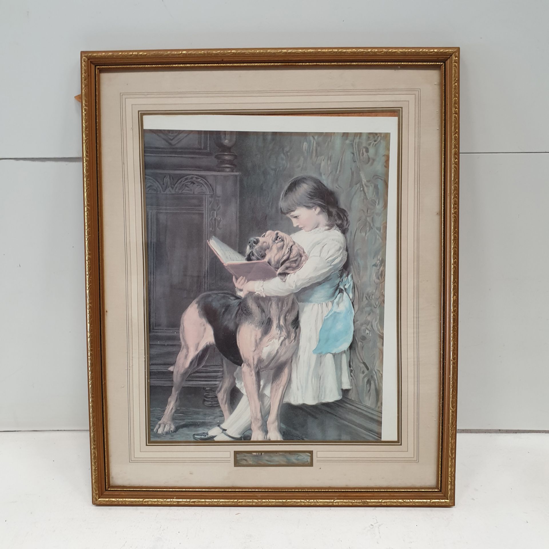 Framed Picture of Girl and Dog. Approx Dimensions 17 1/4" x 21".