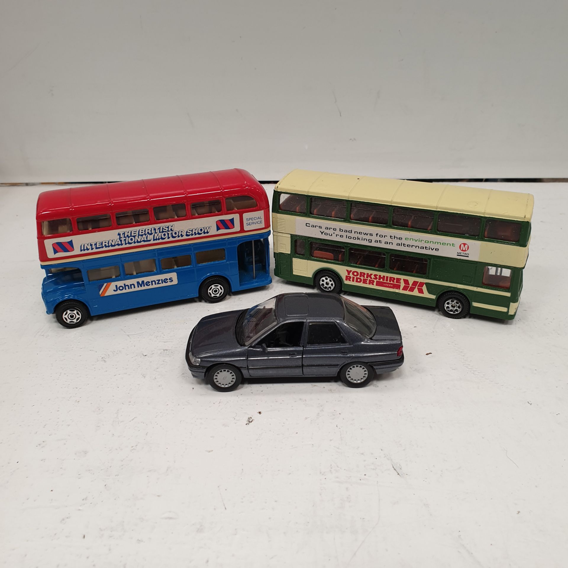3 x Diecast Models. Includes 2 Busses and 1 Car.