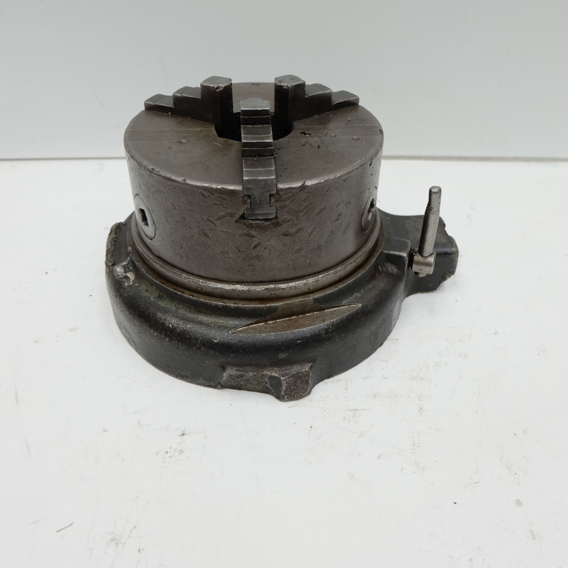 3 Jaw Chuck Approx 6 1/2". On Swivel Base.