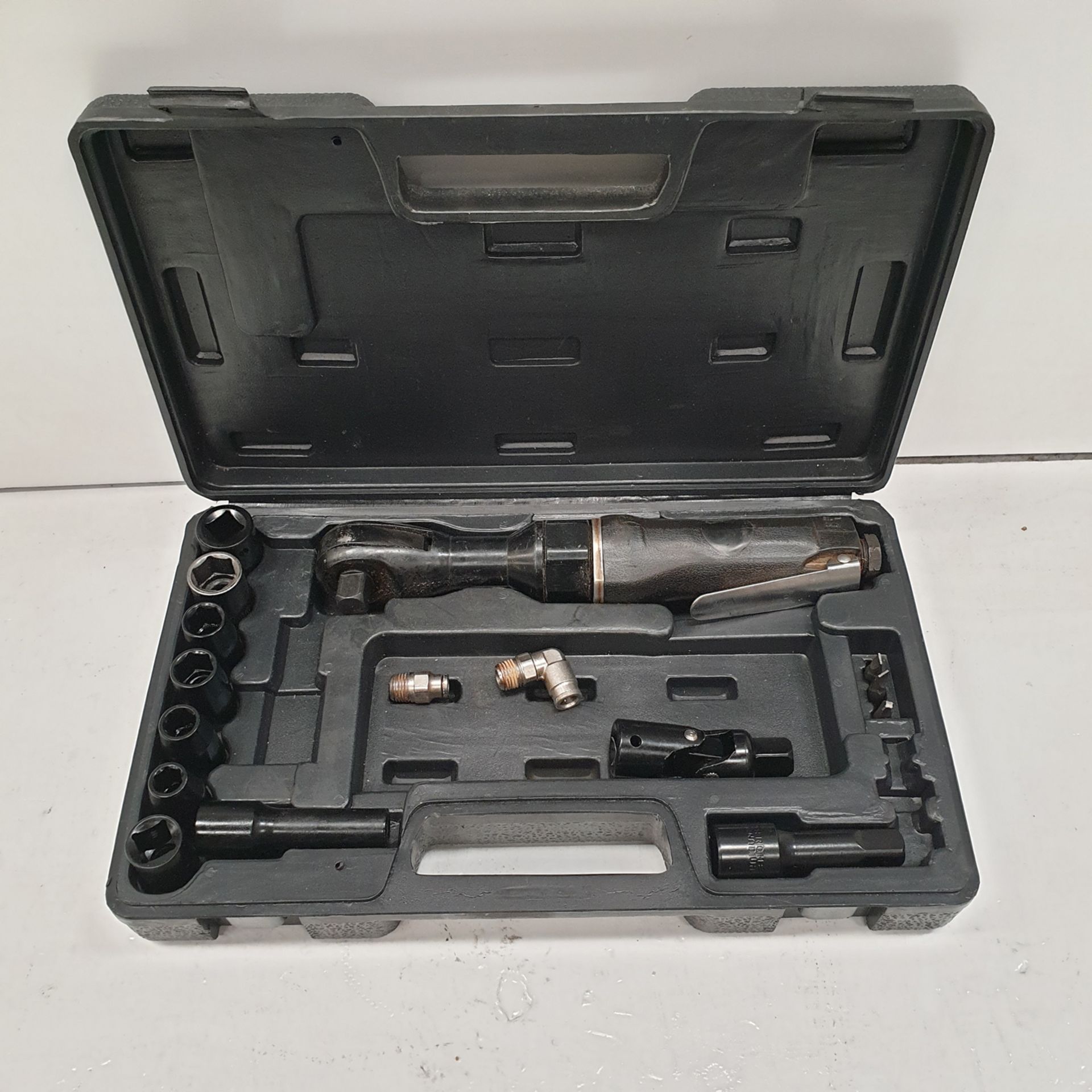 Pneumatic Wrench with Accessories.