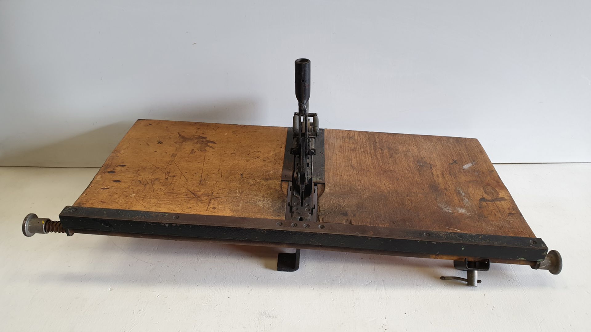 Bench Top Manual Hand Cropper with Homemade Table.