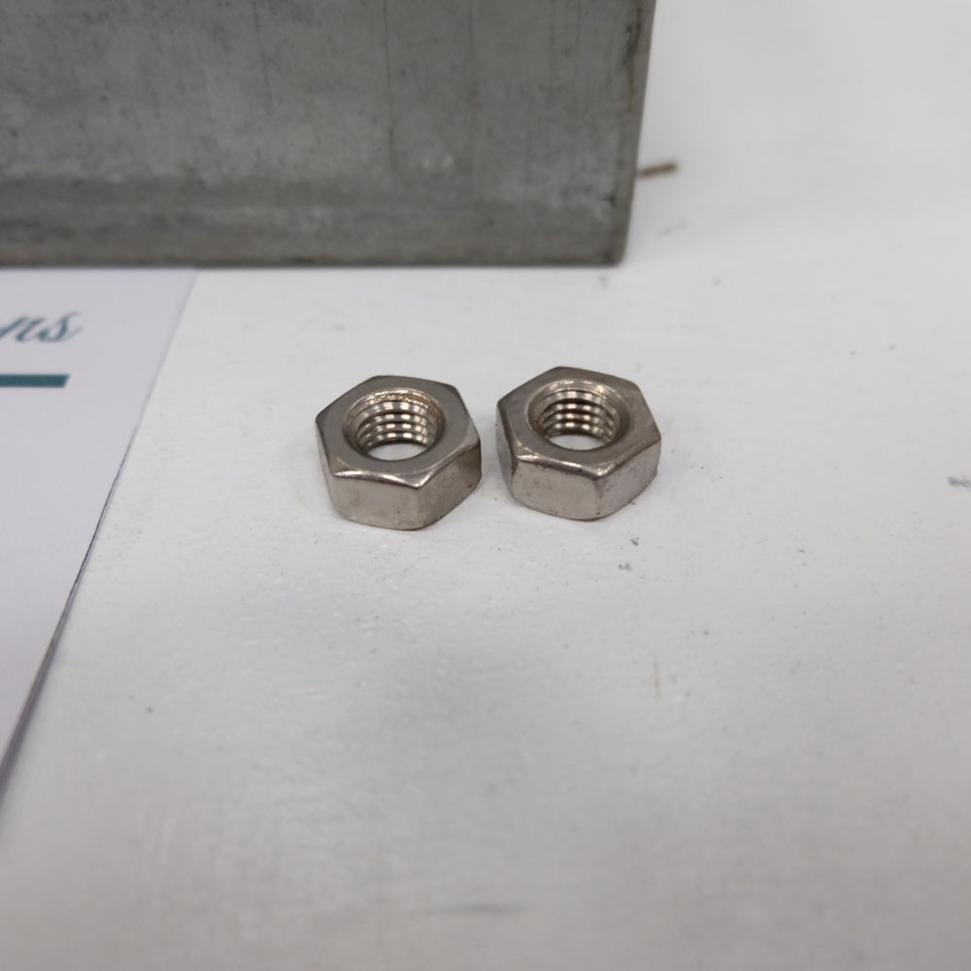 Quantity of Hex Nuts as Lotted. Labelled M10 Stainless Steel. - Image 3 of 4