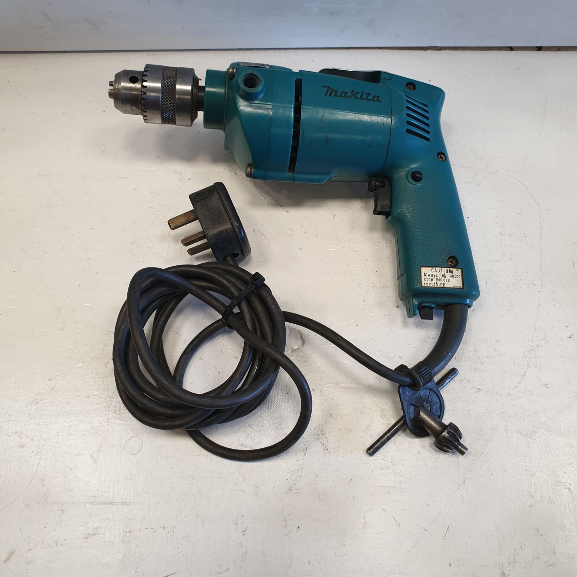 Makita Drill. Model DP4700. 2.3A 50-60Hz 510W.