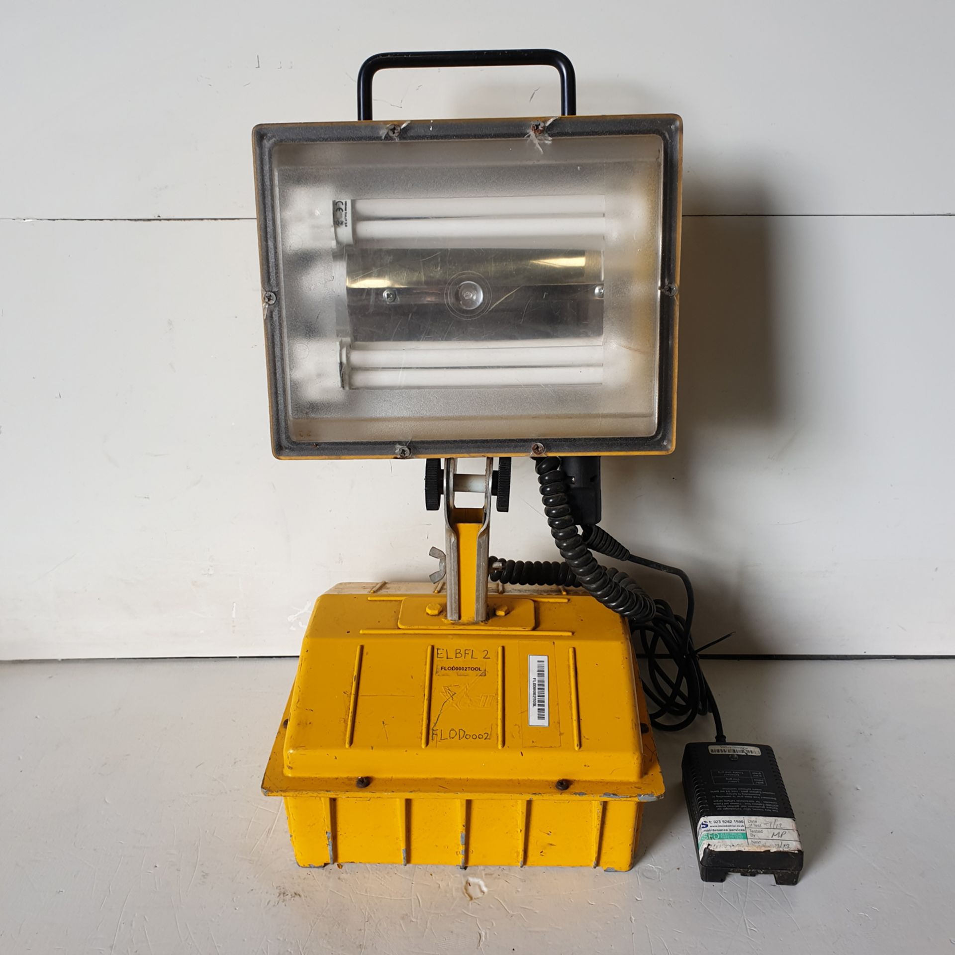 Portable Compact Battery Operated Floodlight. (Not Tested - Battery Charger Missing).