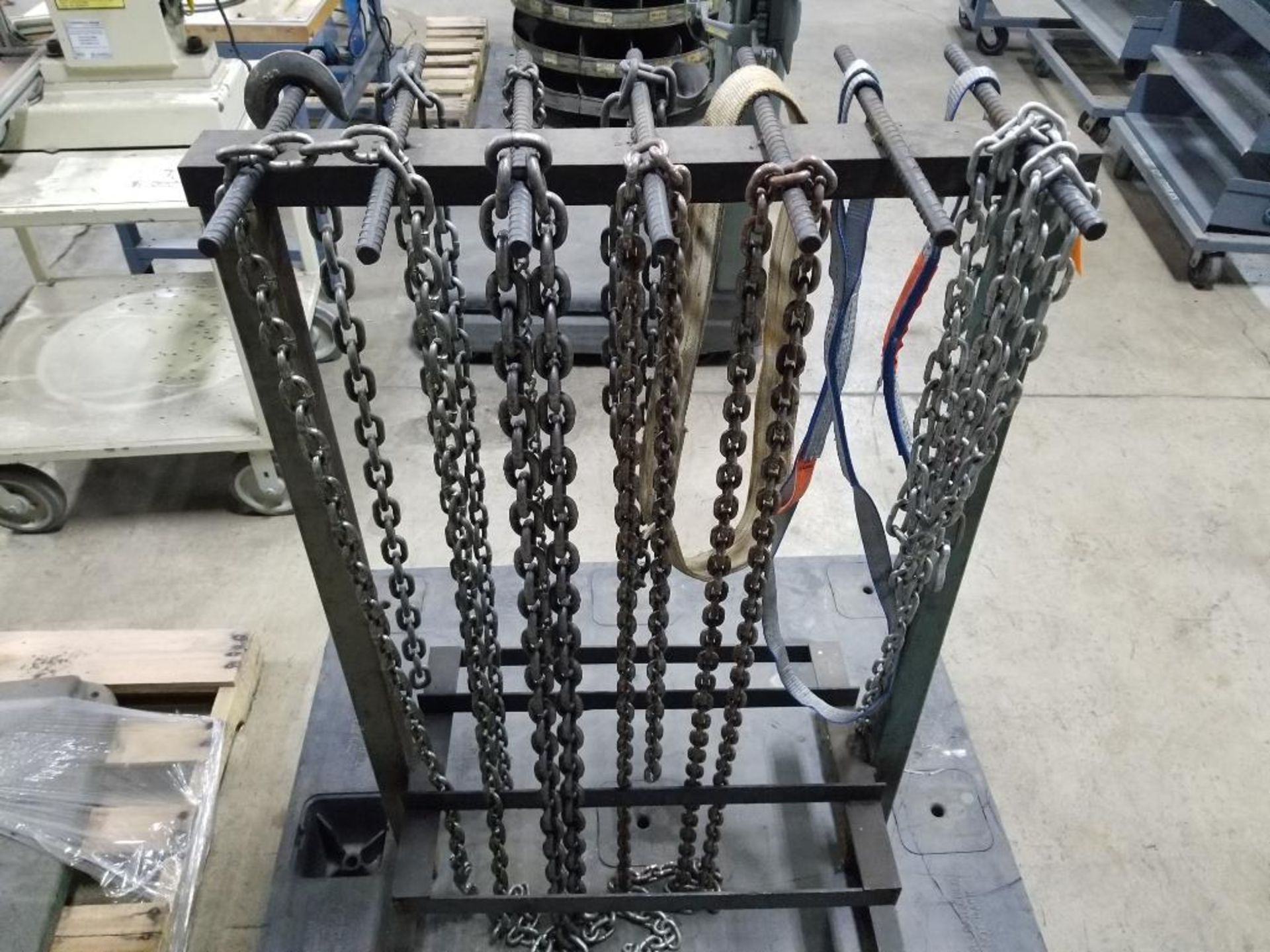 Chain-fall / straps rack, includes chains and lifting straps as pictured.