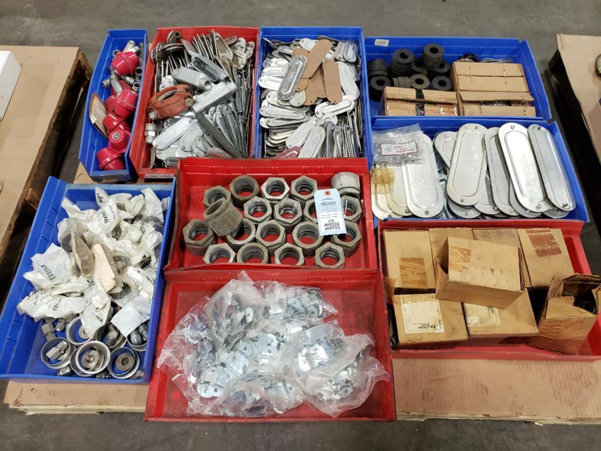 Pallet of assorted replacement parts. Conduit, fittings, covers.