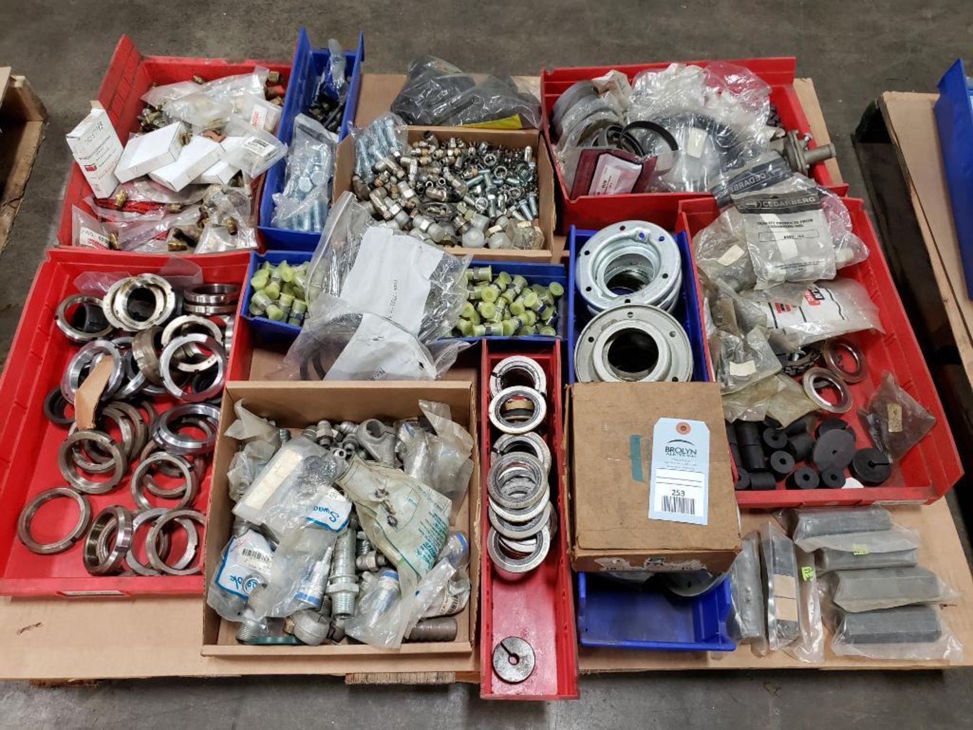 Pallet of assorted hardware. Rings, hubs, fittings.