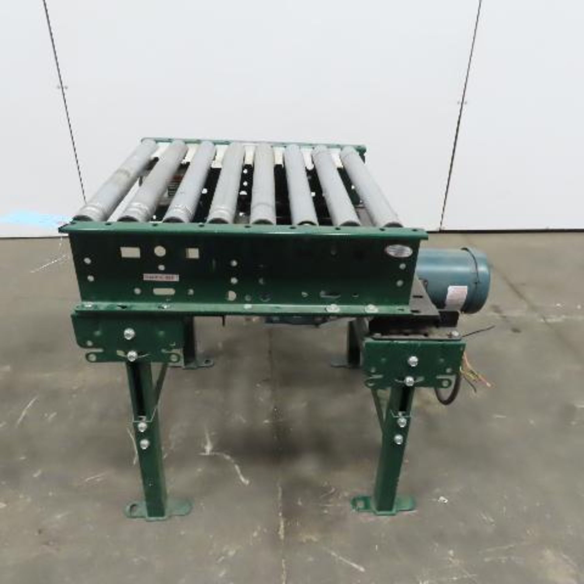 Rapistan Dematic 25"W x 24"L 22"BF Belt Driven Roller Conveyor 50FPM W/Legs 3Ph.