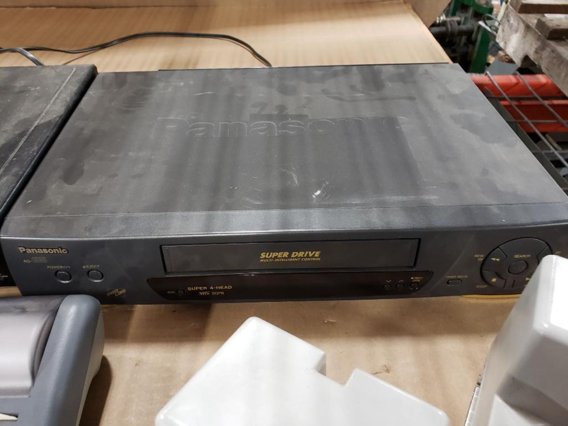 Assorted electrical power supply, charging stations, VCR, DVD players. - Image 6 of 6