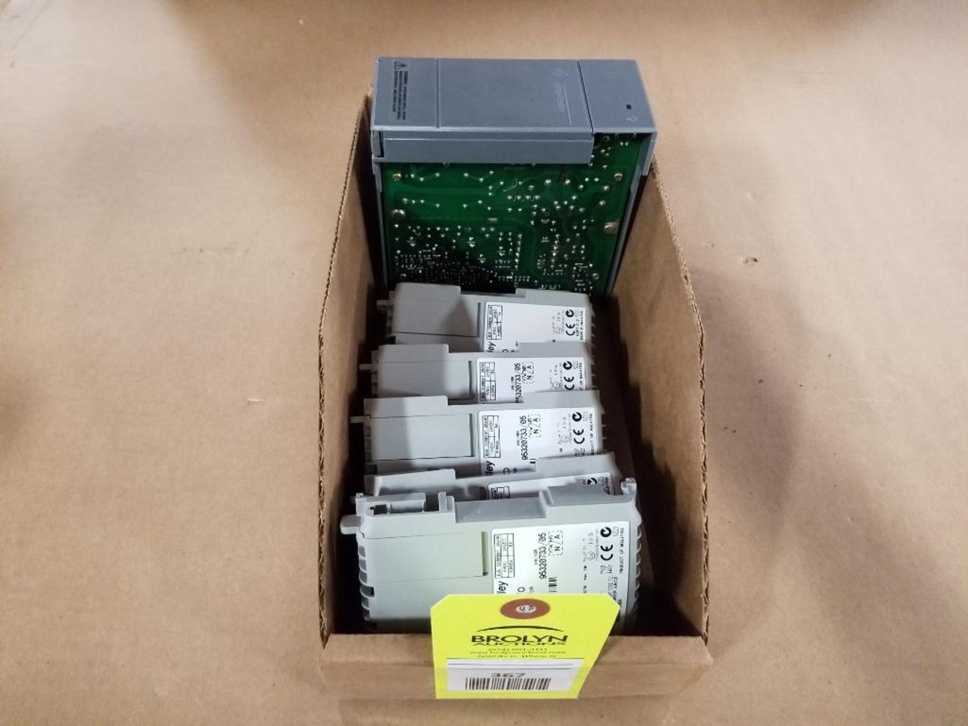 Assorted Allen Bradley I/O modules and power supply.
