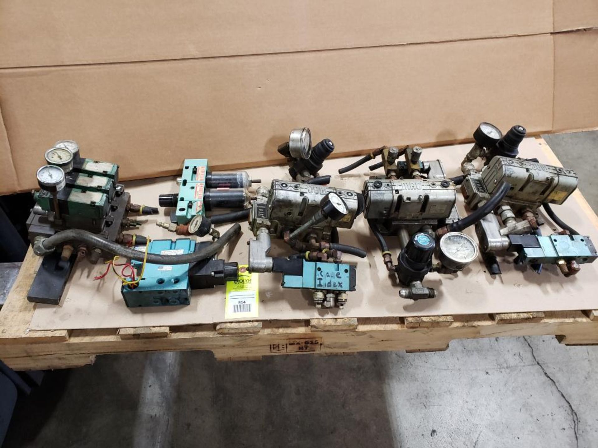 Assorted flow control valves, regulator, filters, gauges. Mac Valves, Numatics.