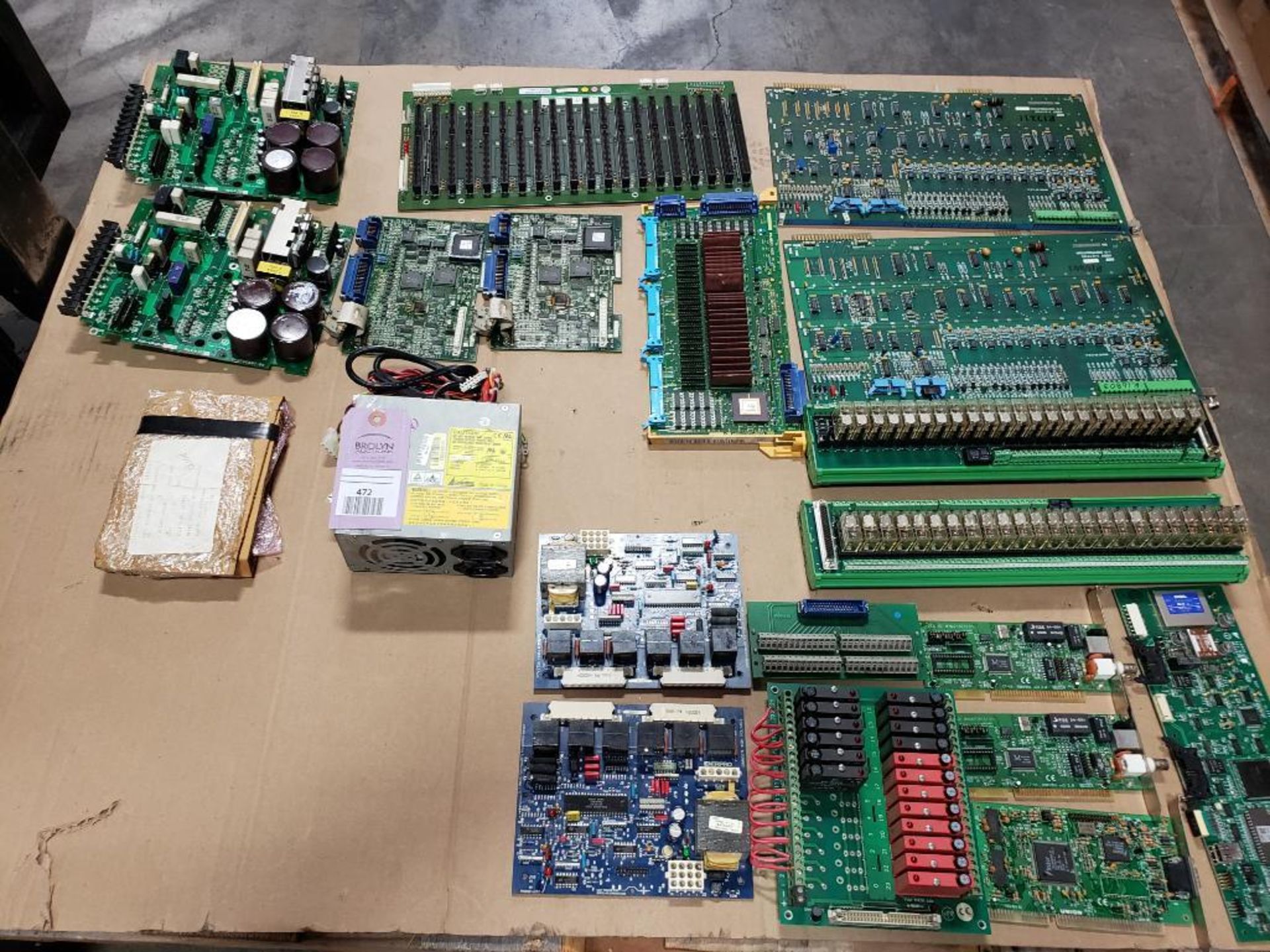Pallet of assorted electrical control boards. Fanuc, Atlas Copco, Fuji.