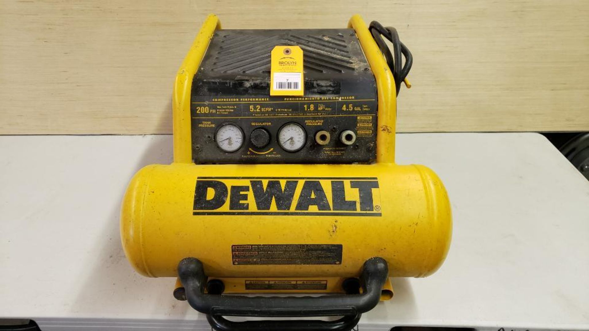 DeWalt D55146 electric 4.5 gal wheeled portable compressor.