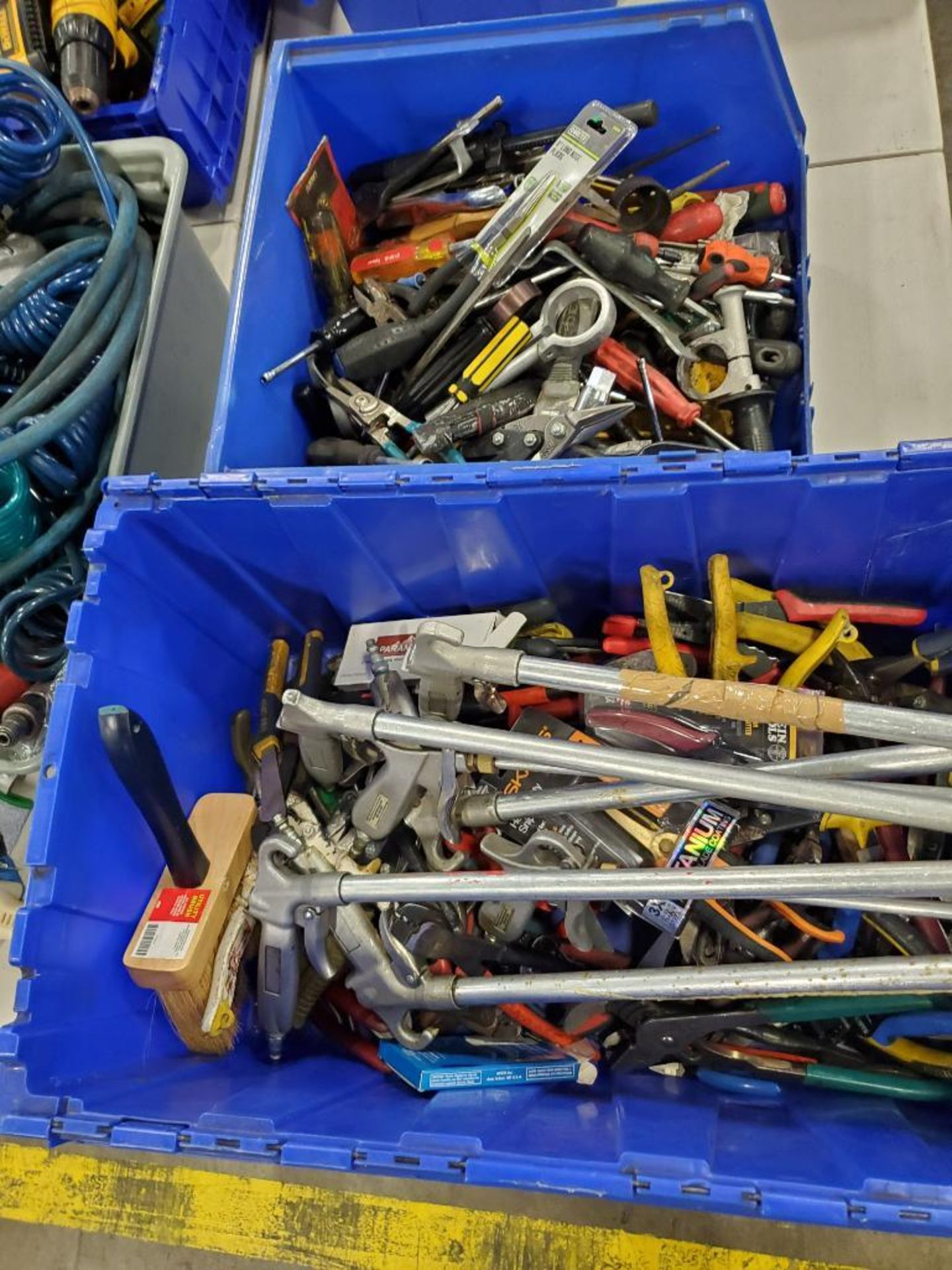 Assorted hand and air tools. Applicators, cutters, pliers, clamps.