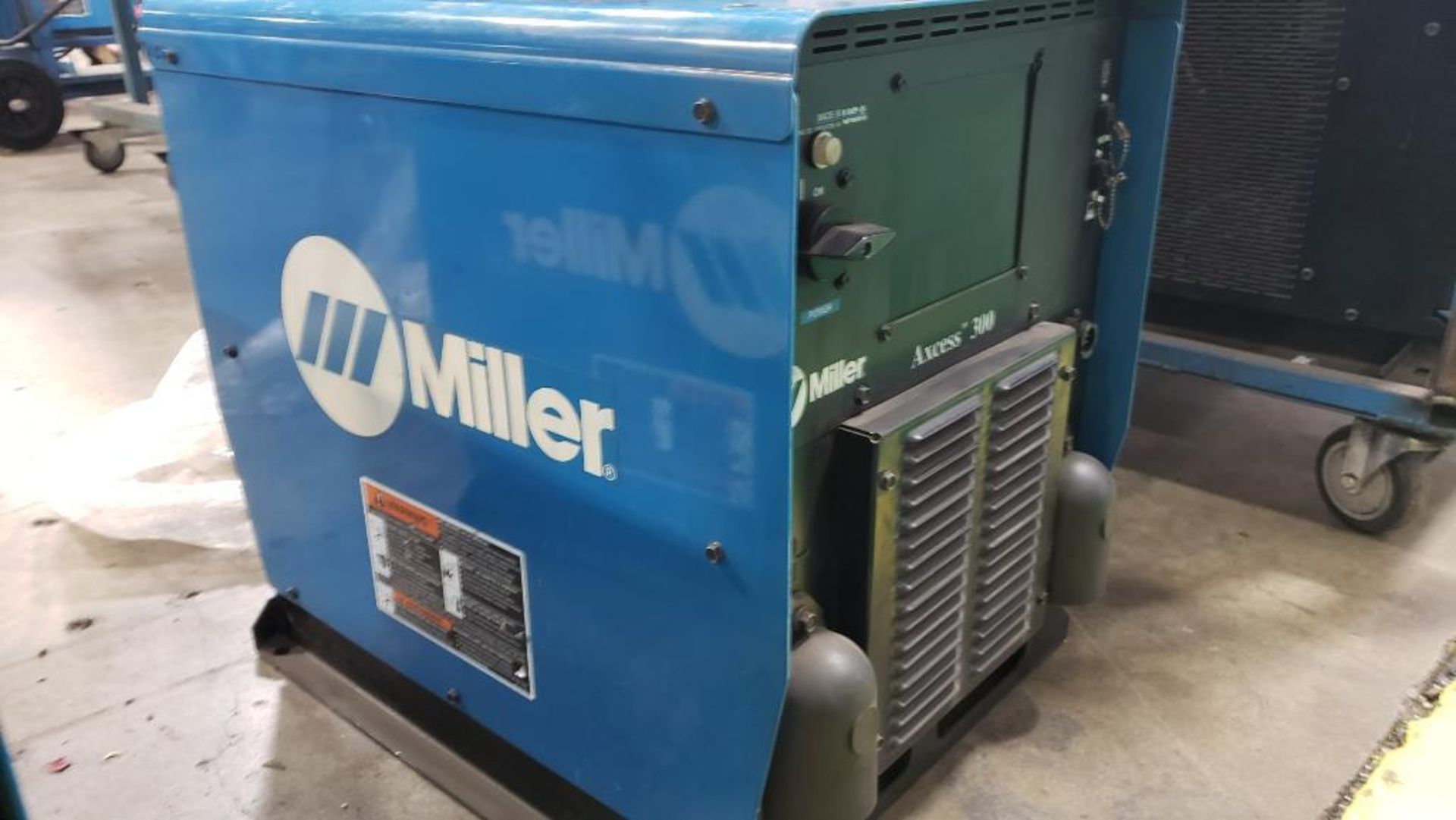 Miller Axcess 300 w/E-STOP welder. 907150012.