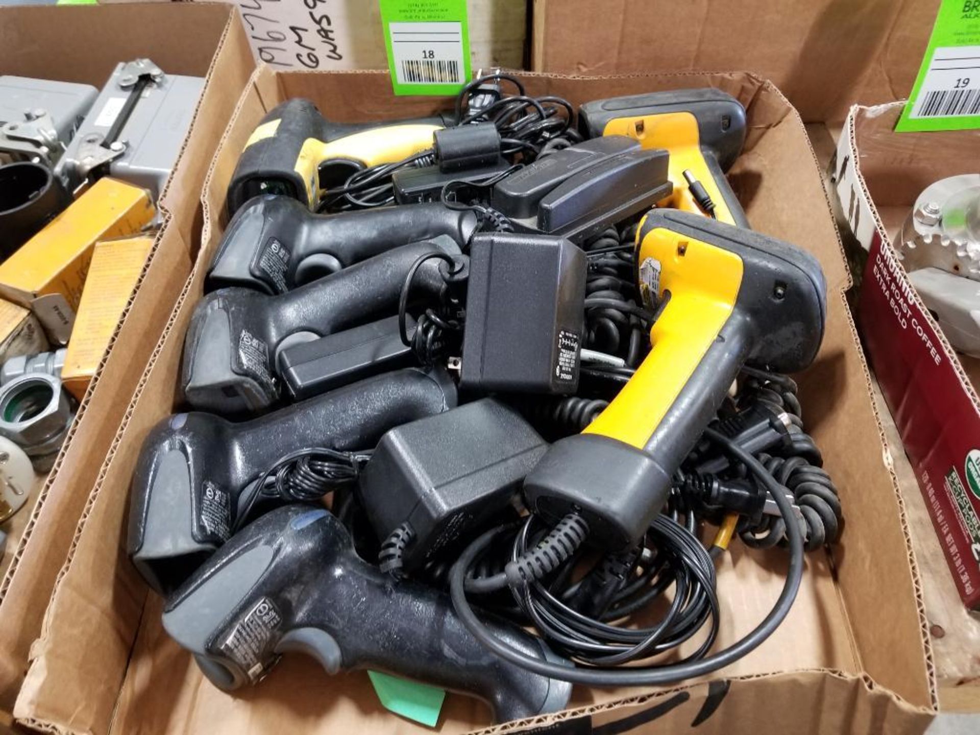 Assorted electrical handheld scanners, power supply, and card reader. Datalogic, Keyence.