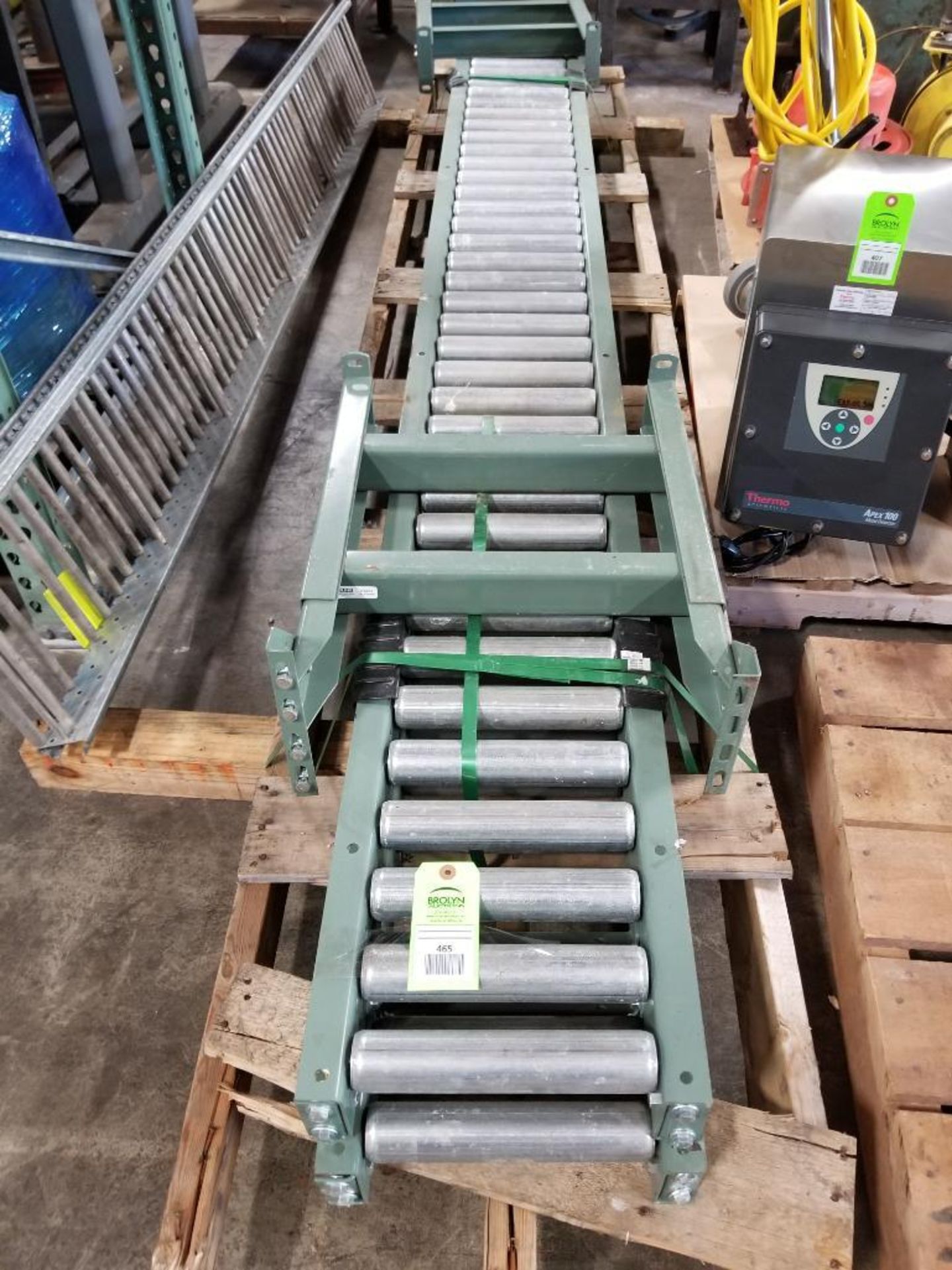 10 FT Length Hytrol Conveyor Company INC roller conveyor. (2) Uline H-5016 18" H-Stand.