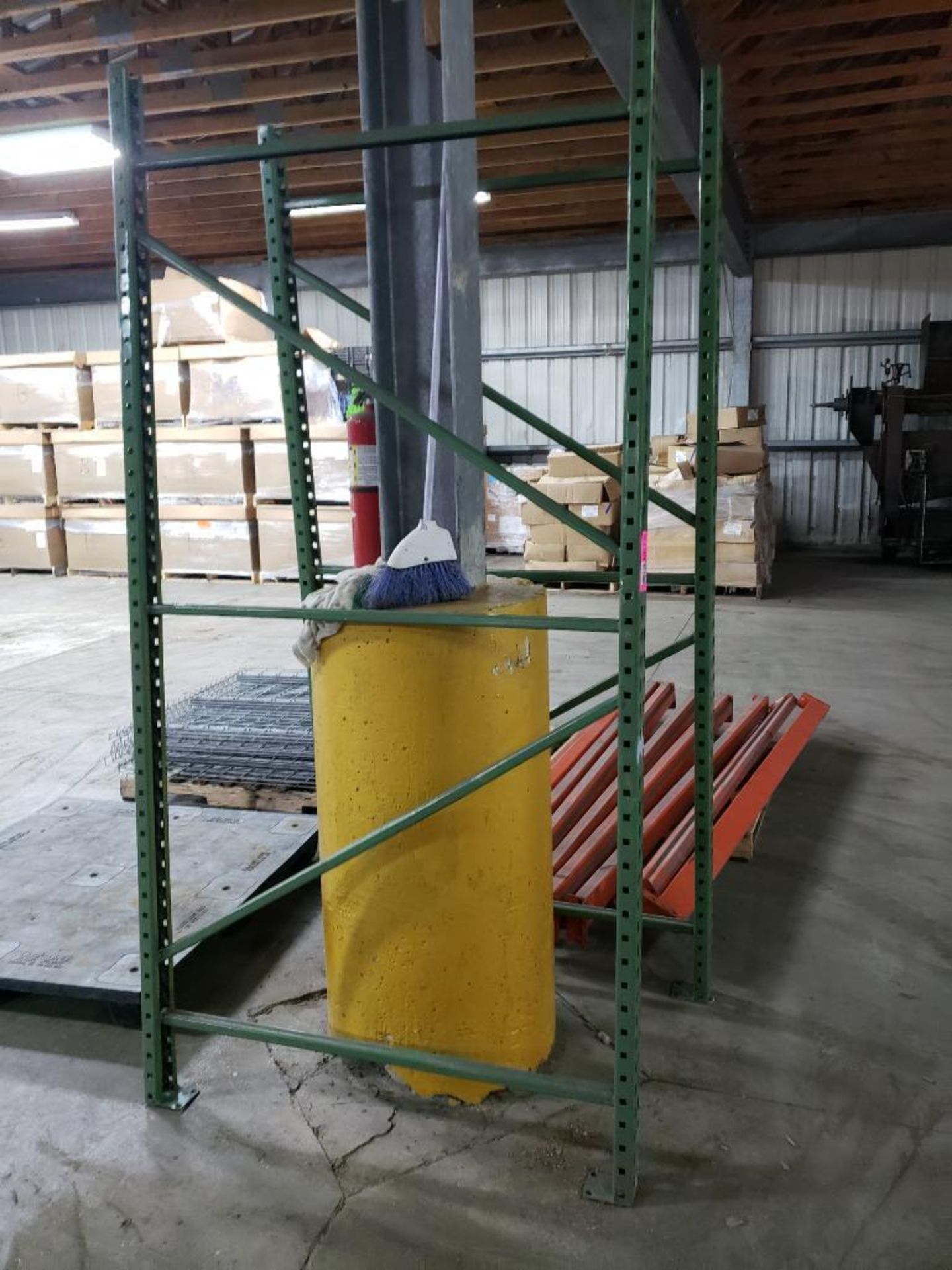One section of pallet racking with cross bars and decking.