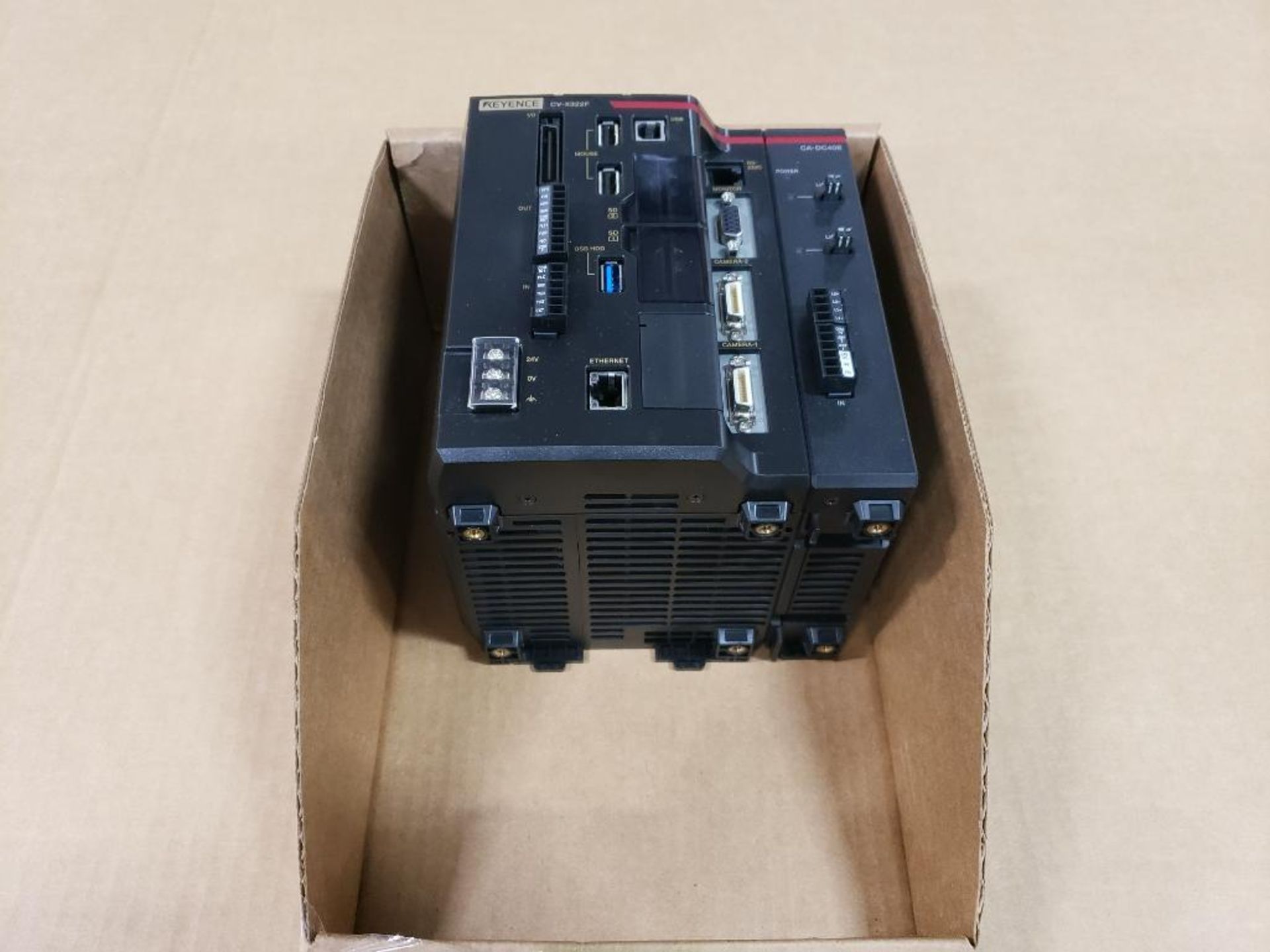 Keyence vision system controller. Part number CV-X322F with sub part CA-DC40E.