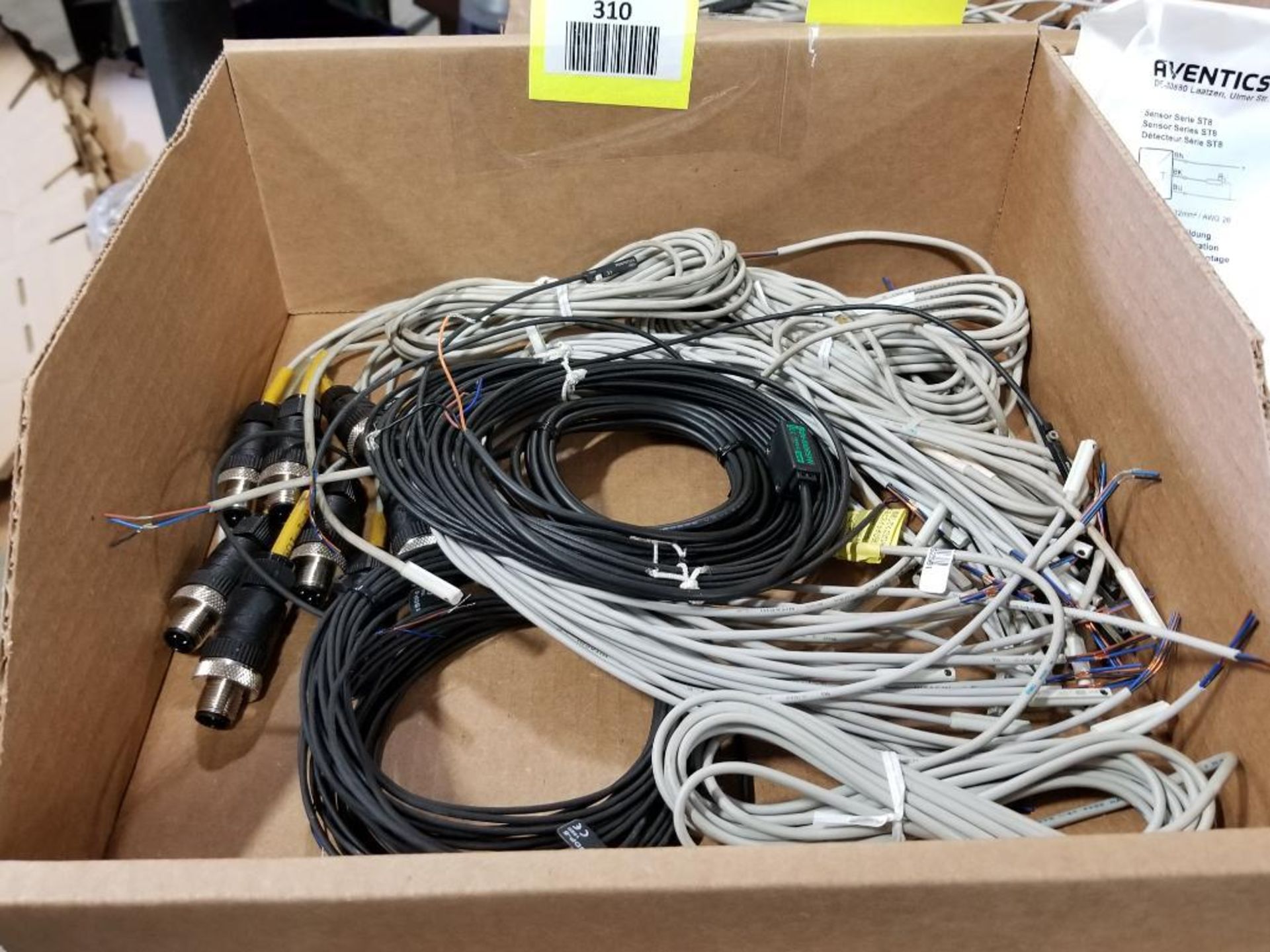 Assorted sensors with cables.