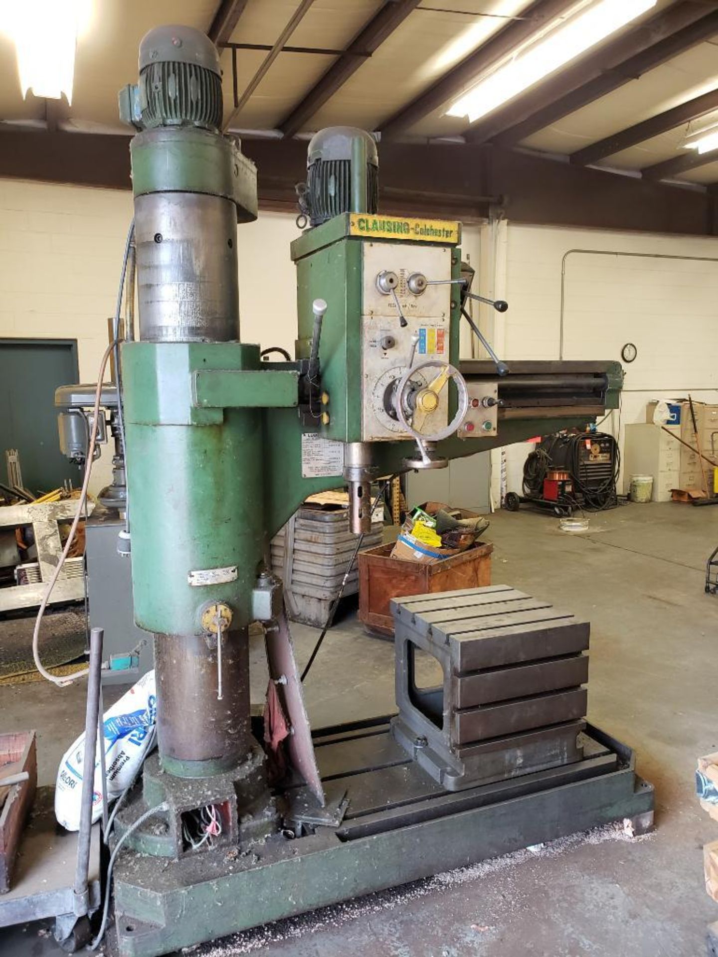 Clausing Colchester radial drill press. NO markings on drill for size. Appears to be 4ft x 12in.