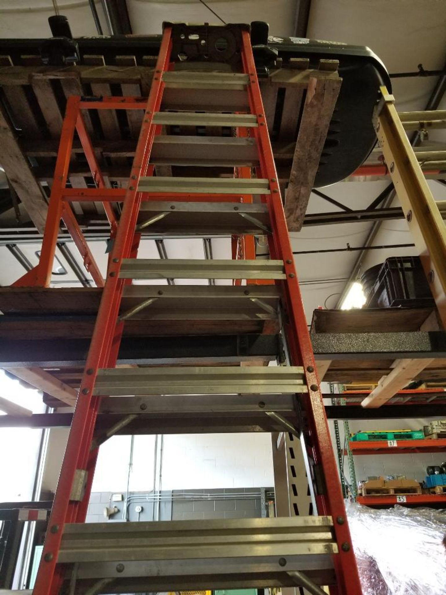 12ft Louisville folding fiberglass ladder. 300lb capacity.