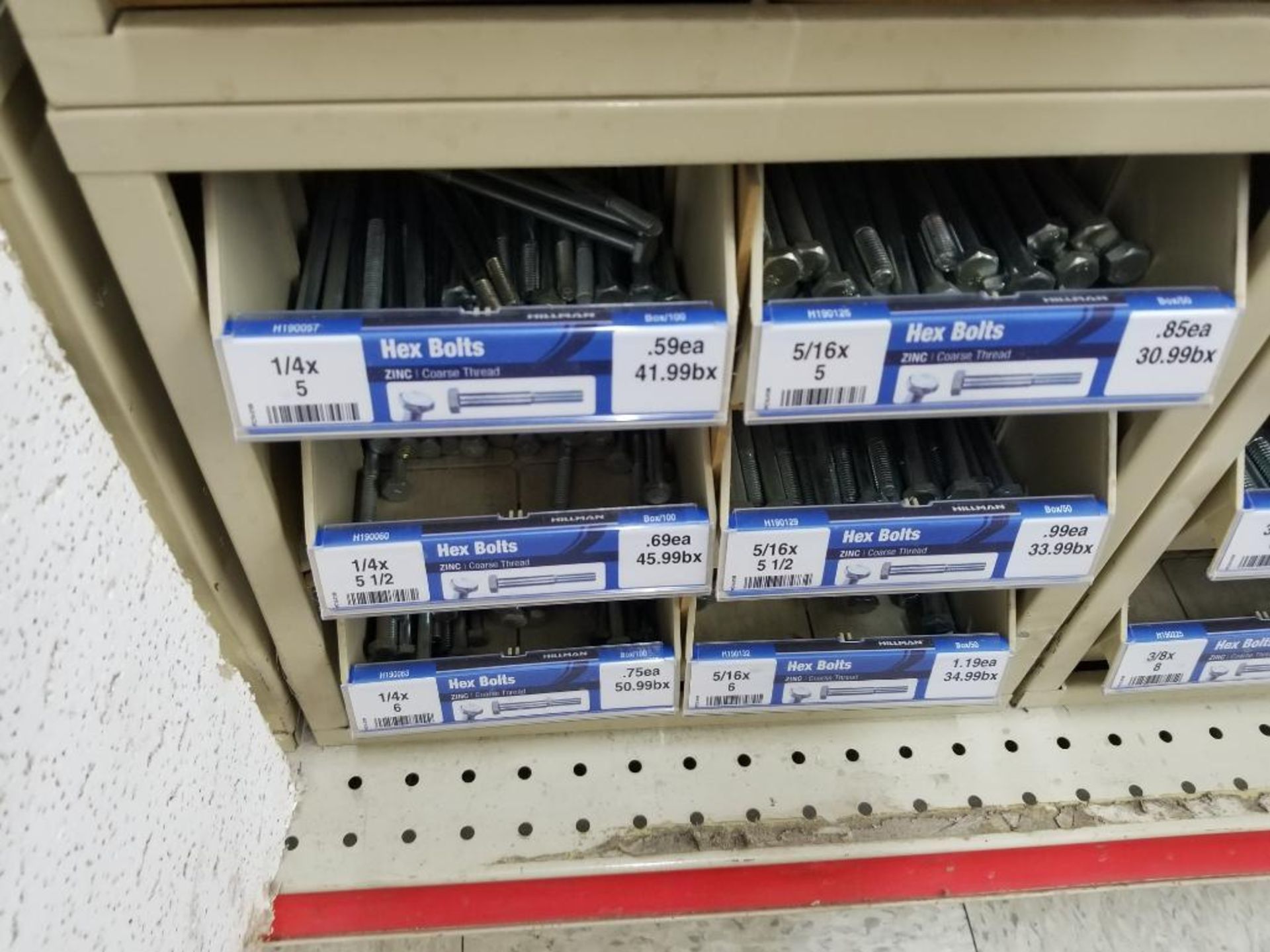 Full column section of bolt fastener display with bins, contents in bins and on top. - Image 10 of 10