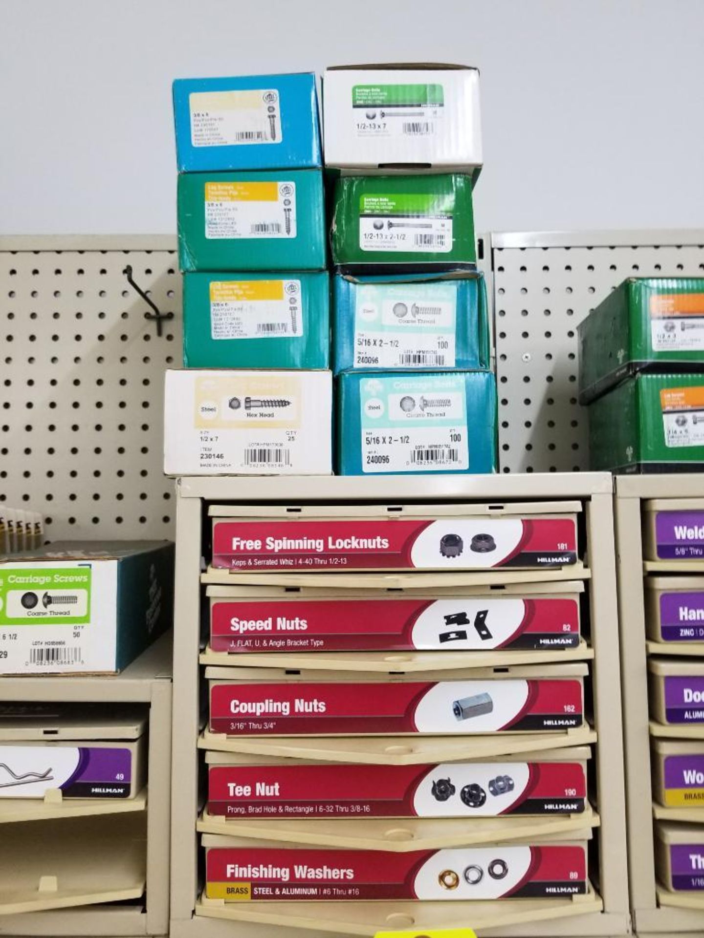 Full column section of bolt fastener display with bins, contents in bins and on top. - Image 3 of 9