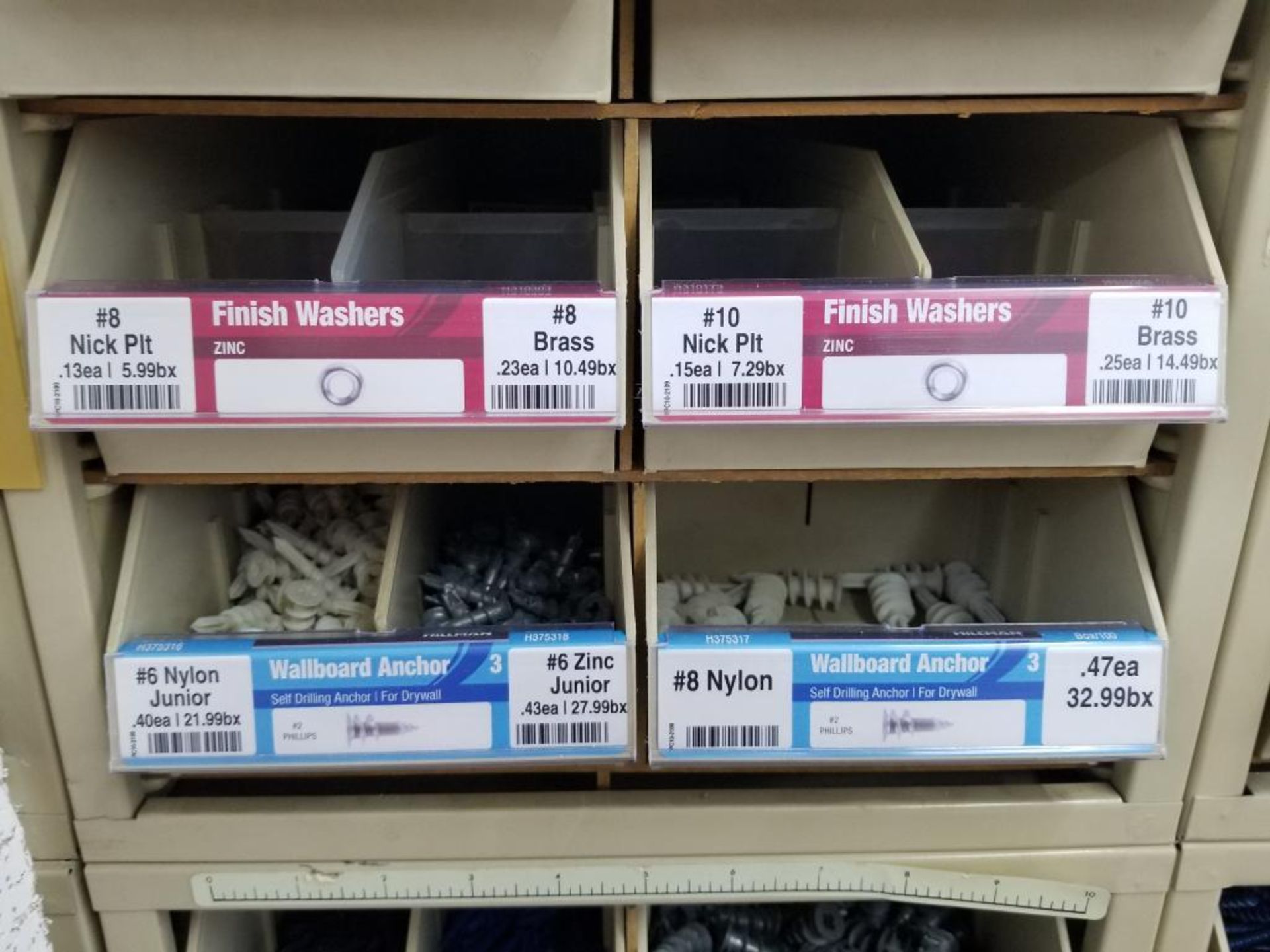 Full column section of bolt fastener display with bins, contents in bins and on top. - Image 9 of 12