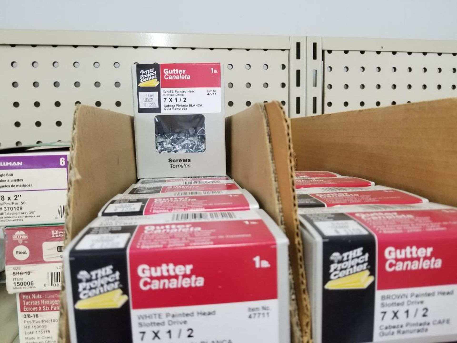 Full column section of bolt fastener display with bins, contents in bins and on top. - Image 5 of 16