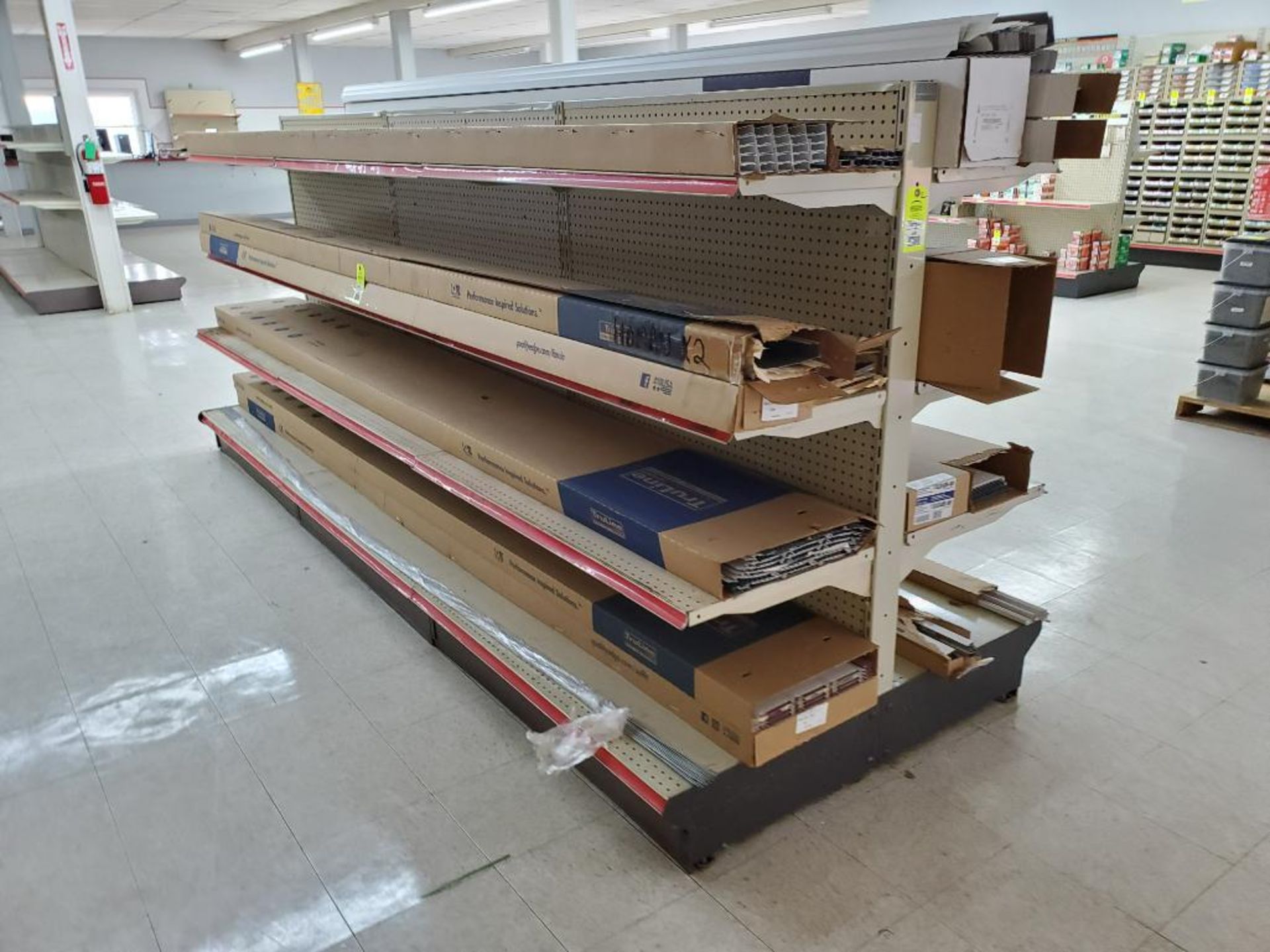 Retail shelving. Contents not included. Delayed removal until contents have been removed.