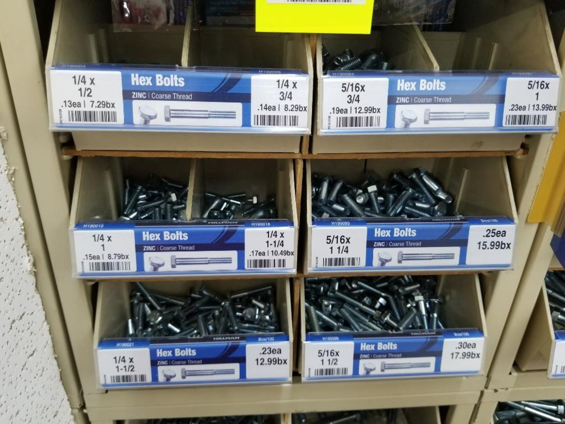 Full column section of bolt fastener display with bins, contents in bins and on top. - Image 7 of 10