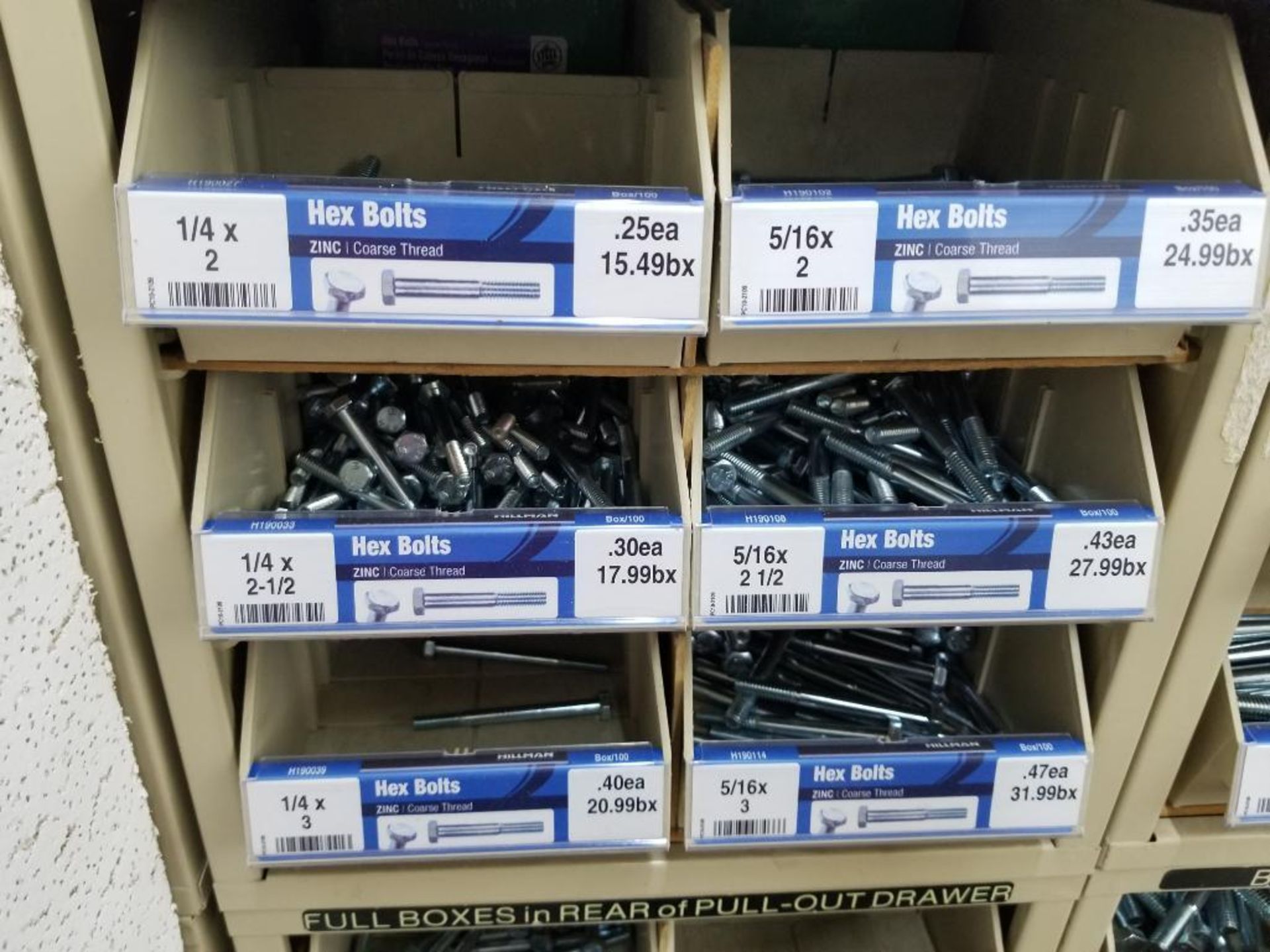 Full column section of bolt fastener display with bins, contents in bins and on top. - Image 8 of 10