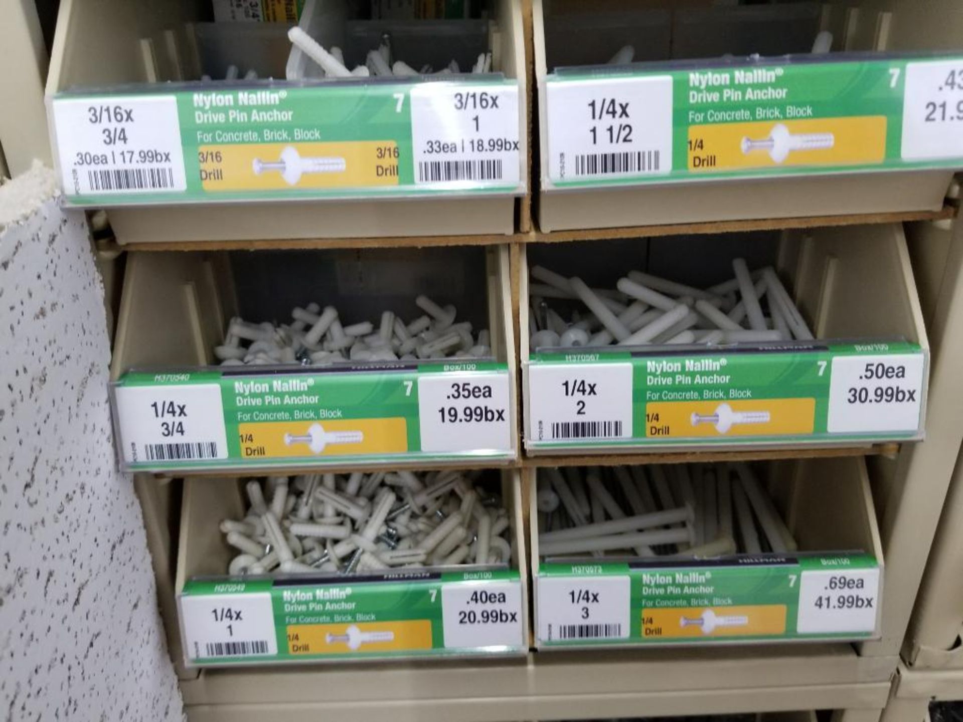 Full column section of bolt fastener display with bins, contents in bins and on top. - Image 16 of 16