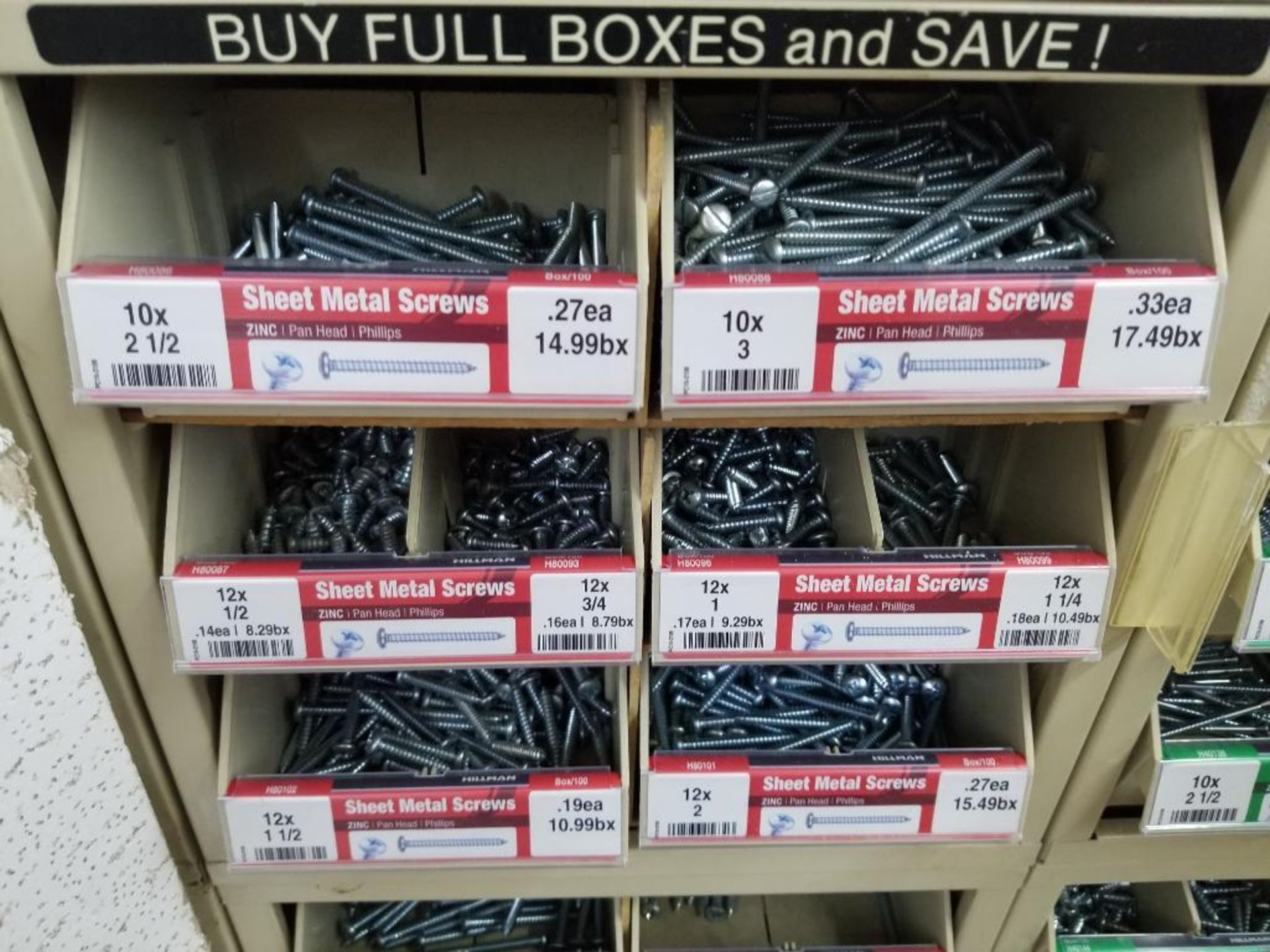 Full column section of bolt fastener display with bins, contents in bins and on top. - Image 8 of 9