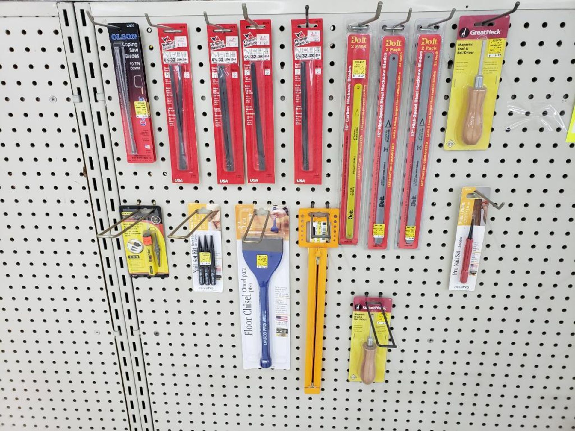 Assorted saw blades, chisels, files, and more. New in package.